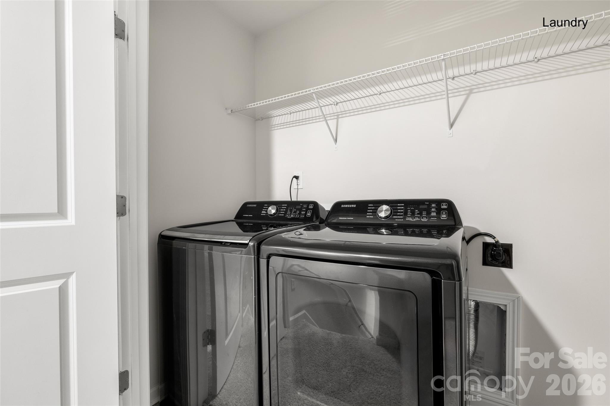 463 West Barr Street Lancaster, SC 29720 - Photo 22 of 43 a close up of a utility room with washer and dryer