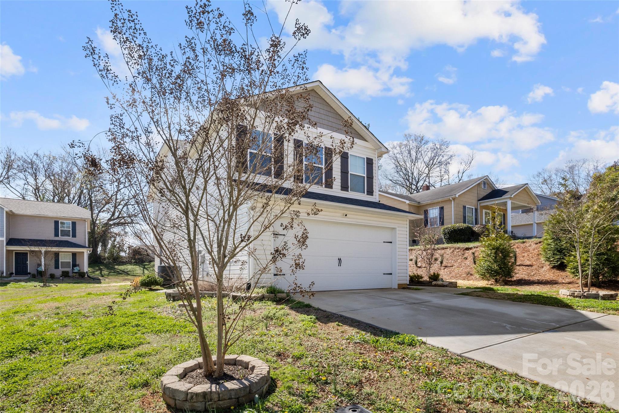 463 West Barr Street Lancaster, SC 29720 - Photo 25 of 43 a front view of a house with a yard covered with snow