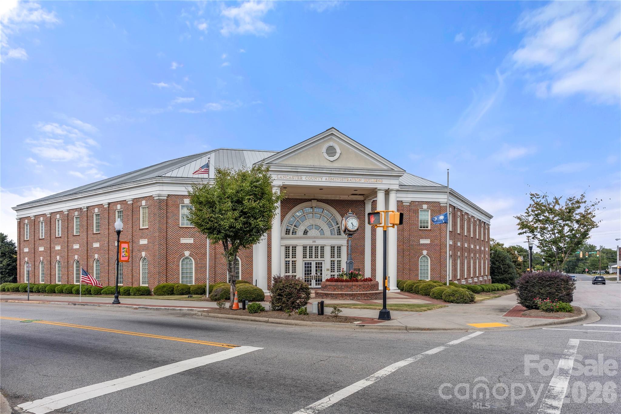 463 West Barr Street Lancaster, SC 29720 - Photo 32 of 43 a front view of a house with a garden