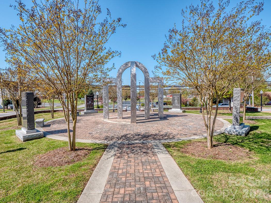 463 West Barr Street Lancaster, SC 29720 - Photo 39 of 43 a front view of a house with a yard