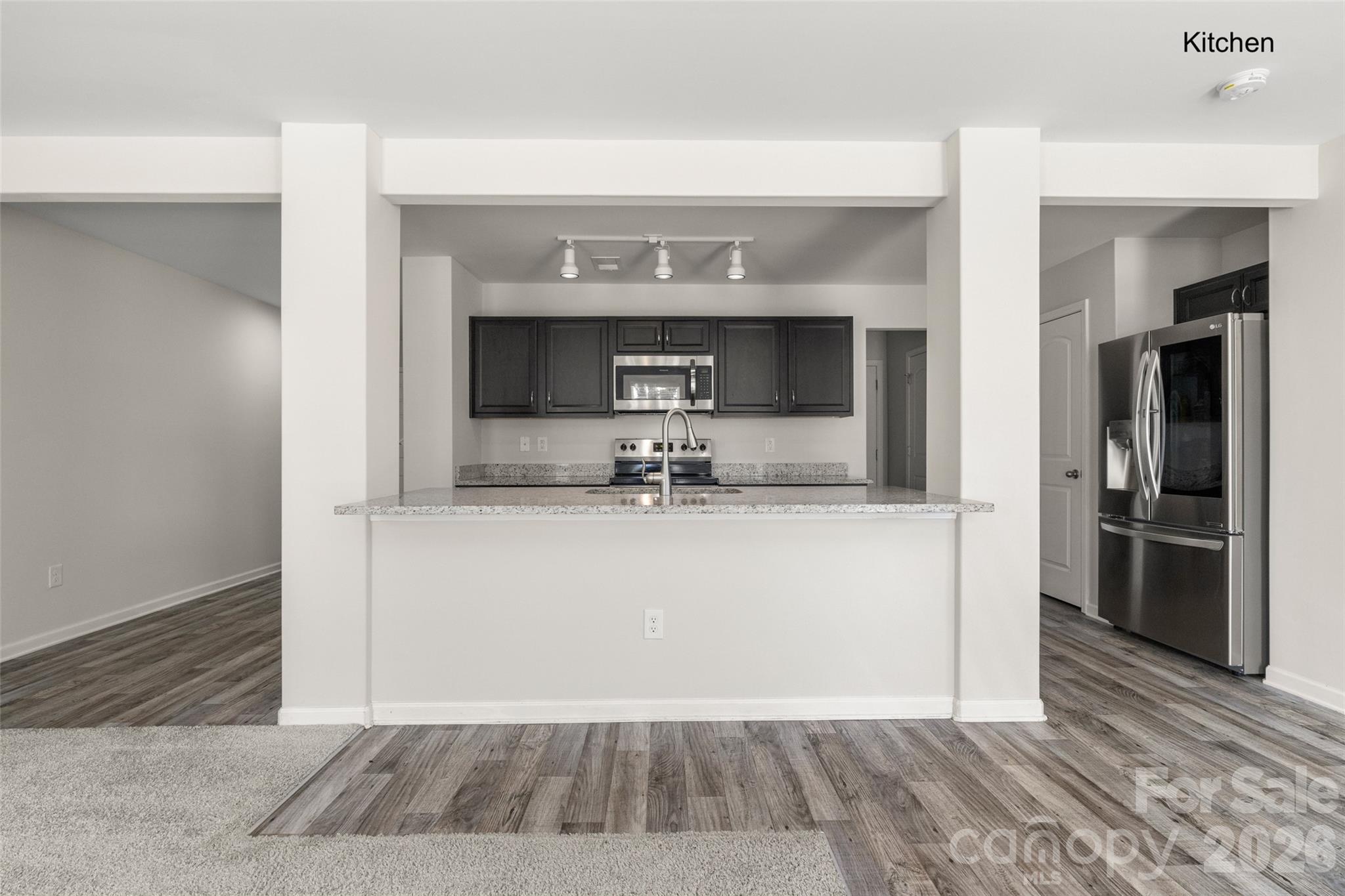 463 West Barr Street Lancaster, SC 29720 - Photo 4 of 43 a living room with a couch and a fireplace