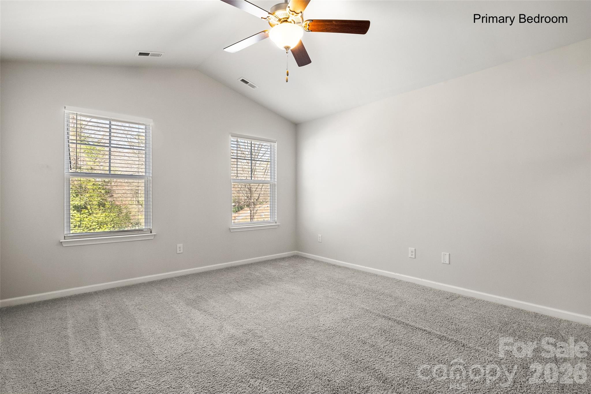 463 West Barr Street Lancaster, SC 29720 - Photo 10 of 43 an empty room with windows and chandelier fan