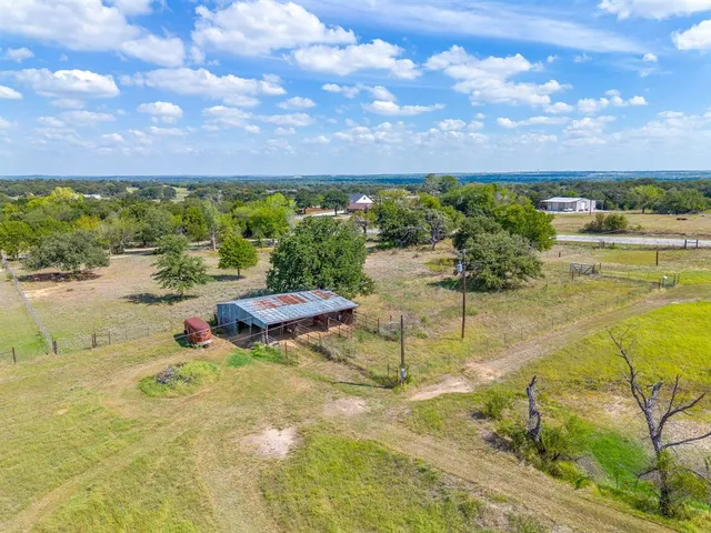 a view of swimming pool with outdoor seating