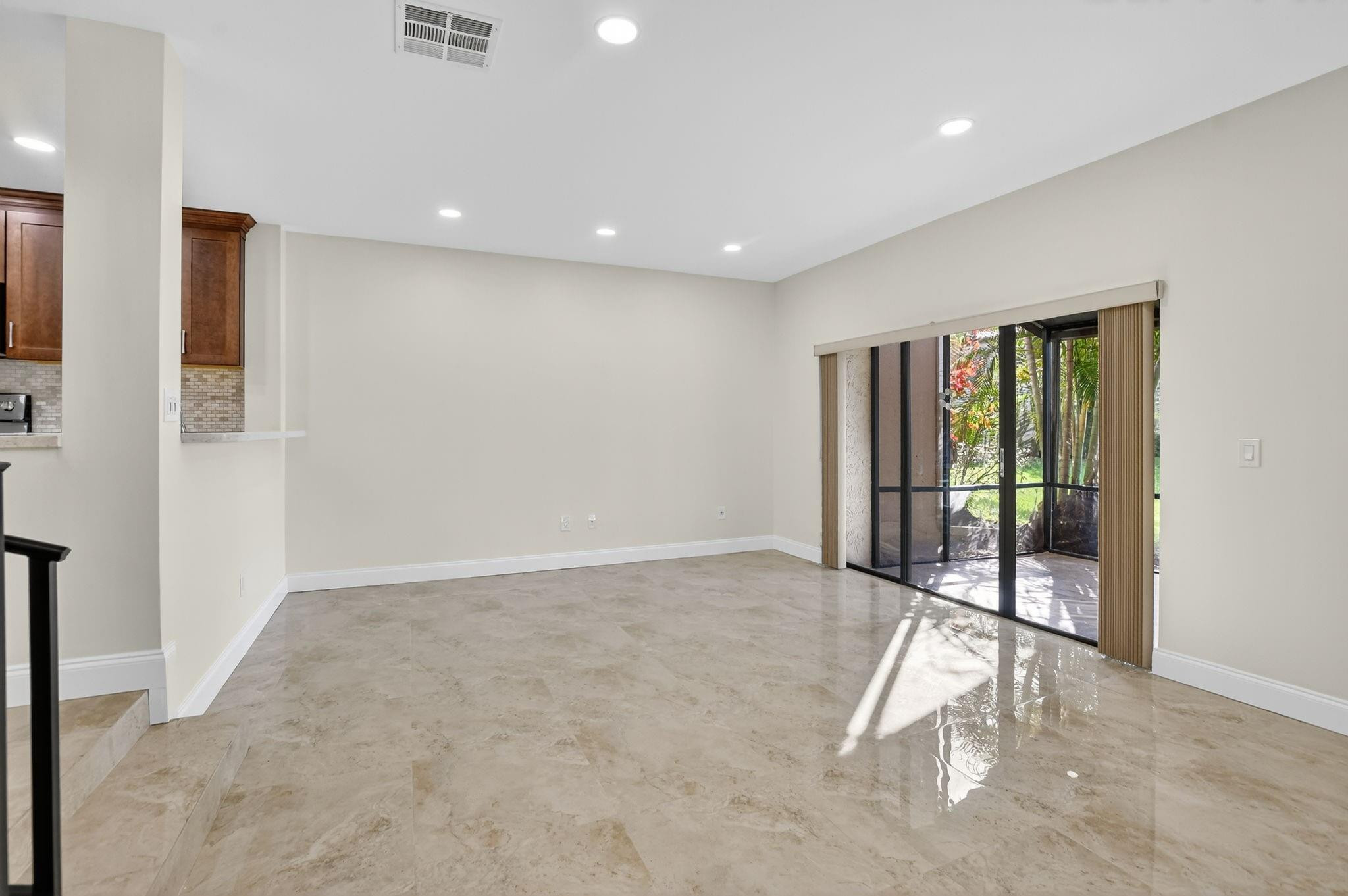21476 Juego Circle, Unit 8C Boca Raton, FL 33433 - Photo 13 of 54 a view of an empty room