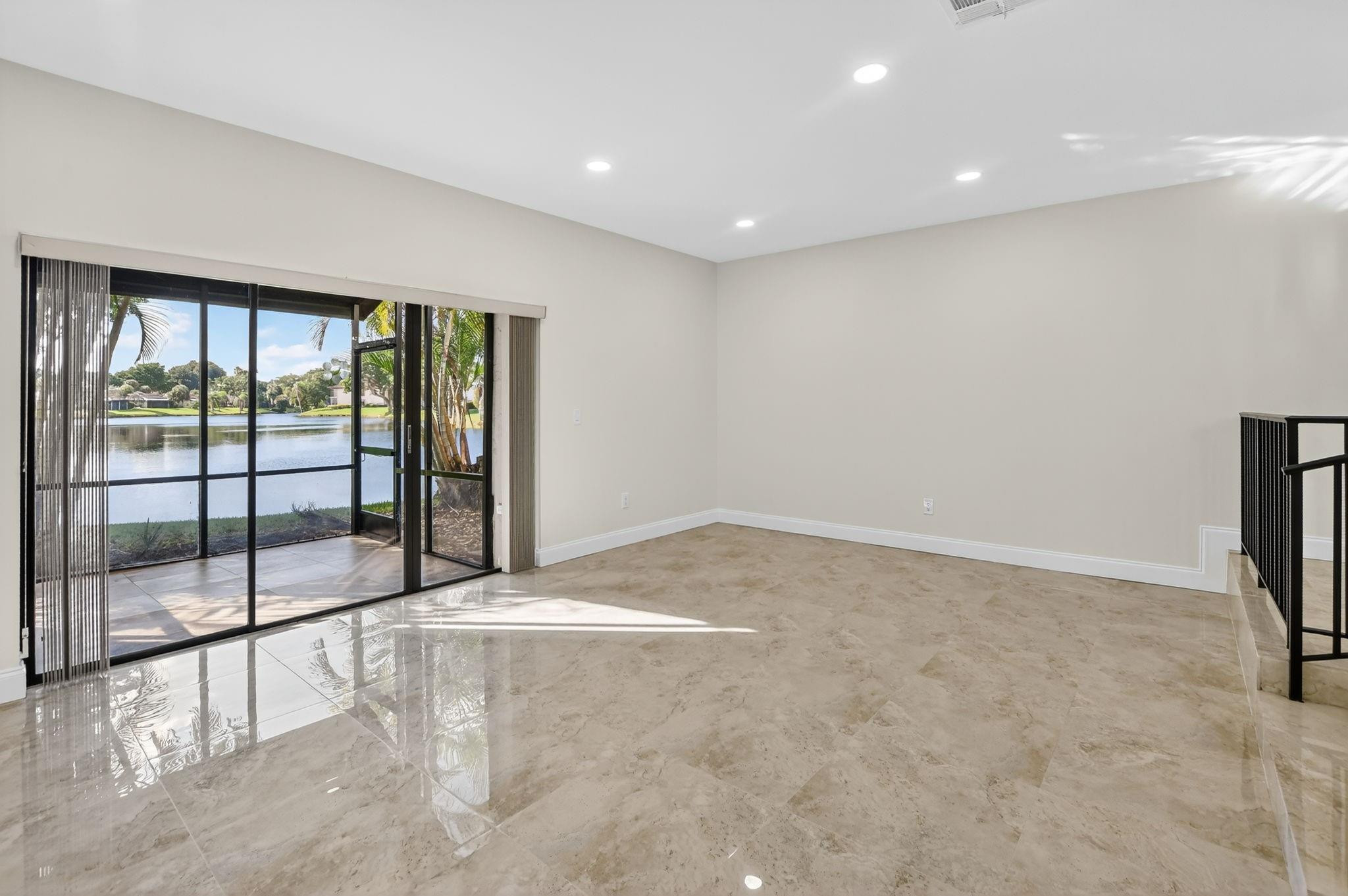 21476 Juego Circle, Unit 8C Boca Raton, FL 33433 - Photo 16 of 54 a view of an empty room