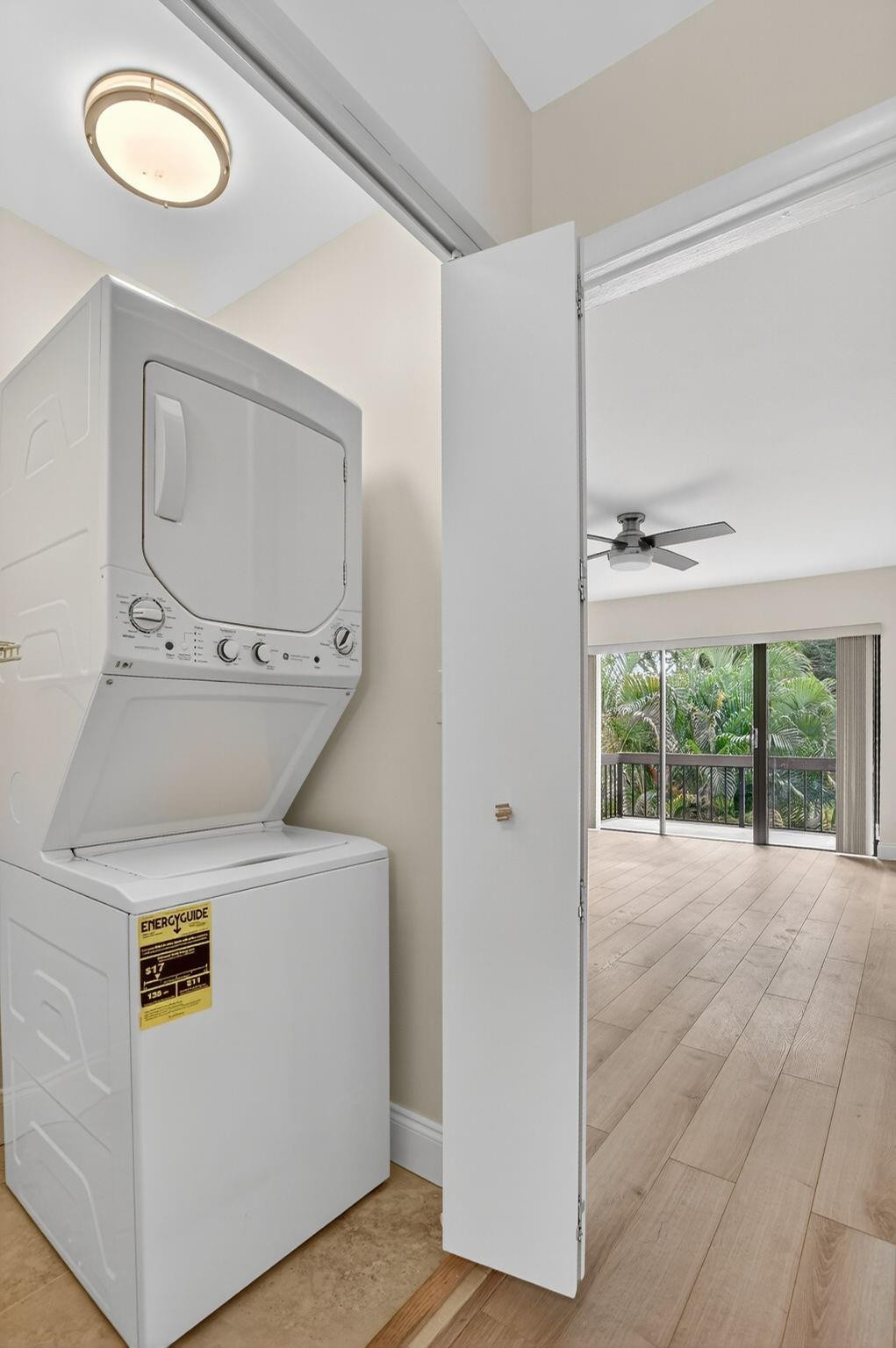 21476 Juego Circle, Unit 8C Boca Raton, FL 33433 - Photo 38 of 54 a view of a livingroom with washer and dryer