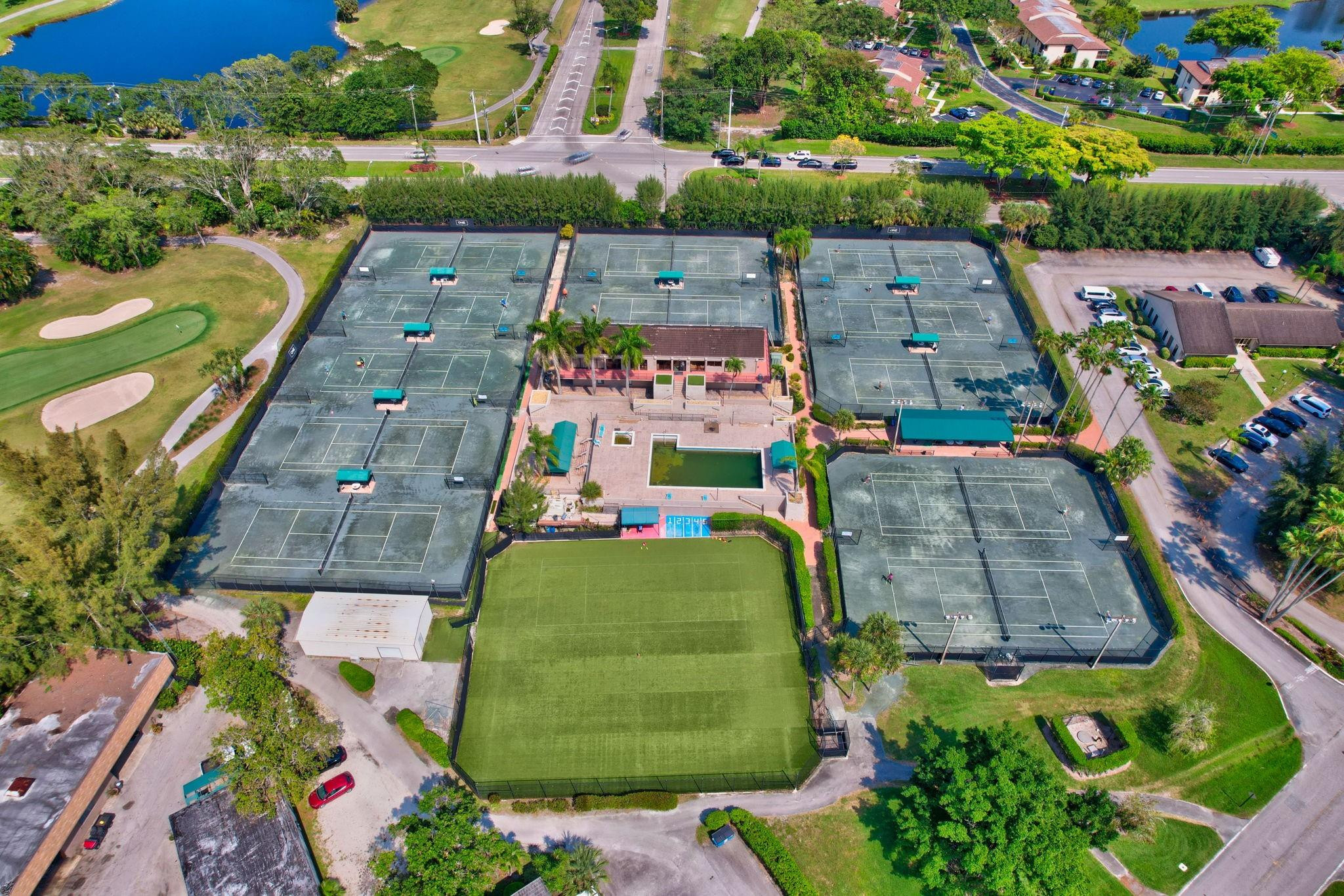 21476 Juego Circle, Unit 8C Boca Raton, FL 33433 - Photo 53 of 54 an aerial view of a house with a garden
