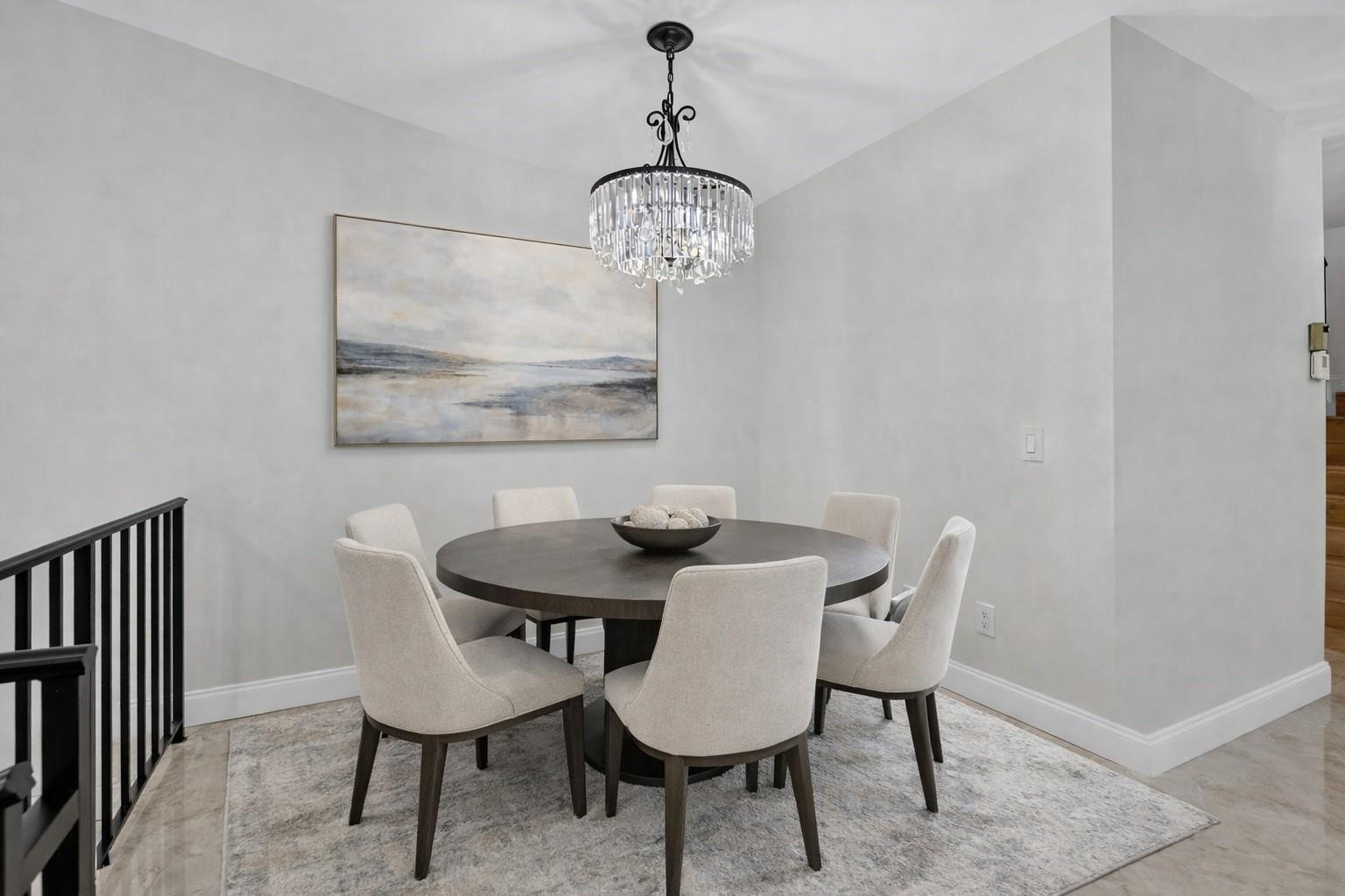 21476 Juego Circle, Unit 8C Boca Raton, FL 33433 - Photo 9 of 54 a view of a dining room with a table and chairs