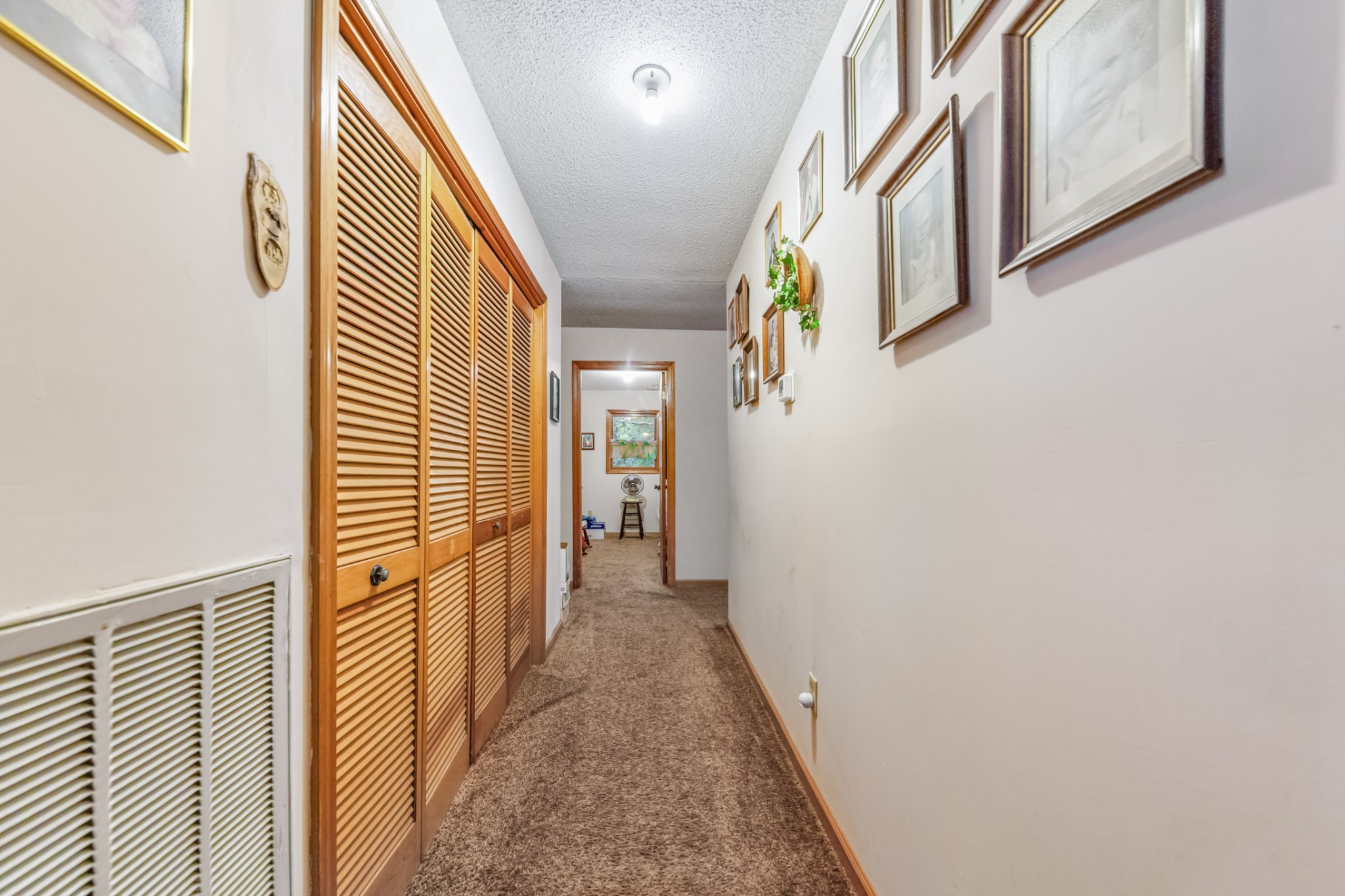 2756 Glasscock Road Lewisburg, TN 37091 - Photo 14 of 48 a view of a hallway with wooden floor and staircase