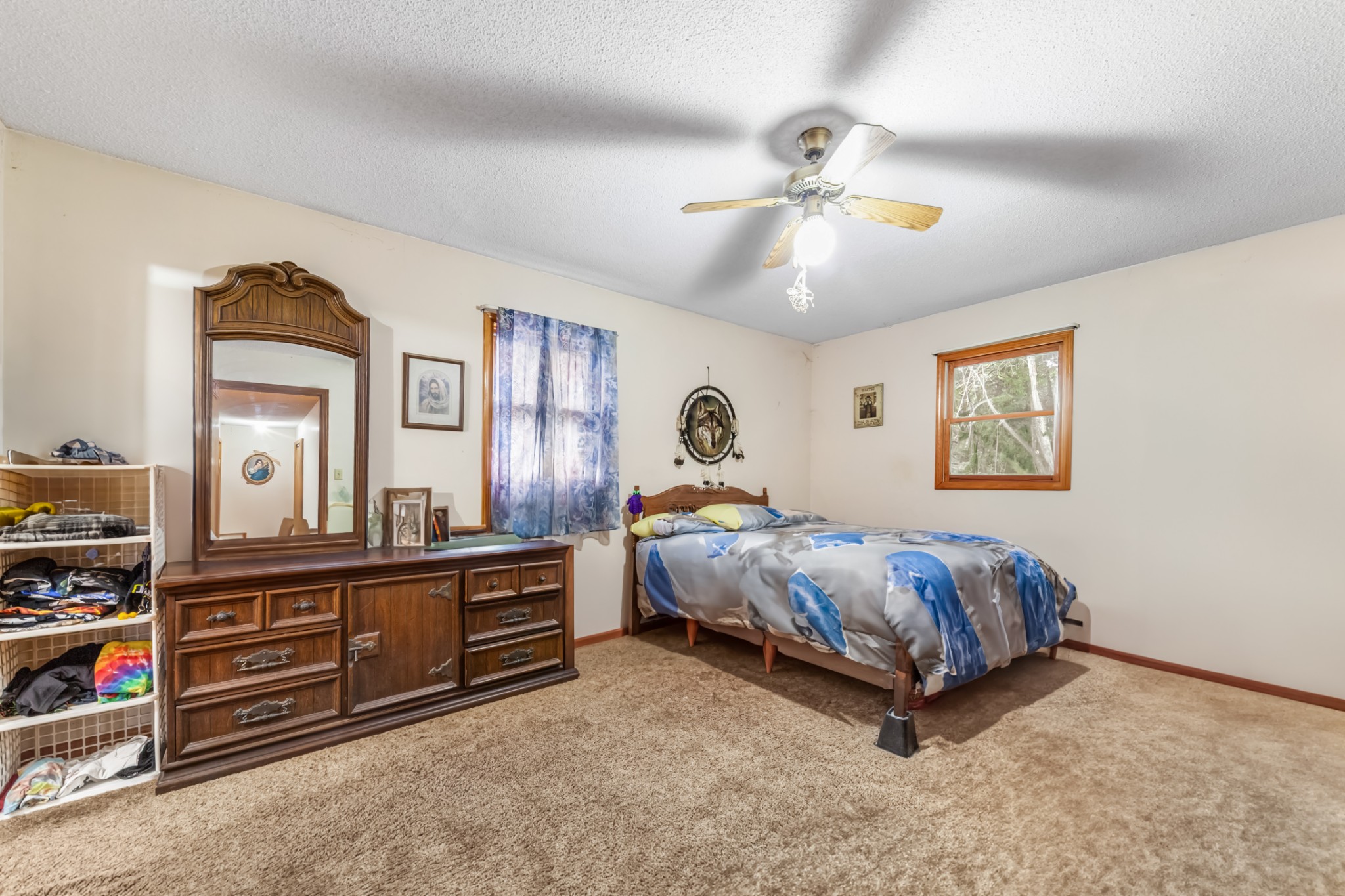 2756 Glasscock Road Lewisburg, TN 37091 - Photo 15 of 48 a bed room with a bed and a chandelier