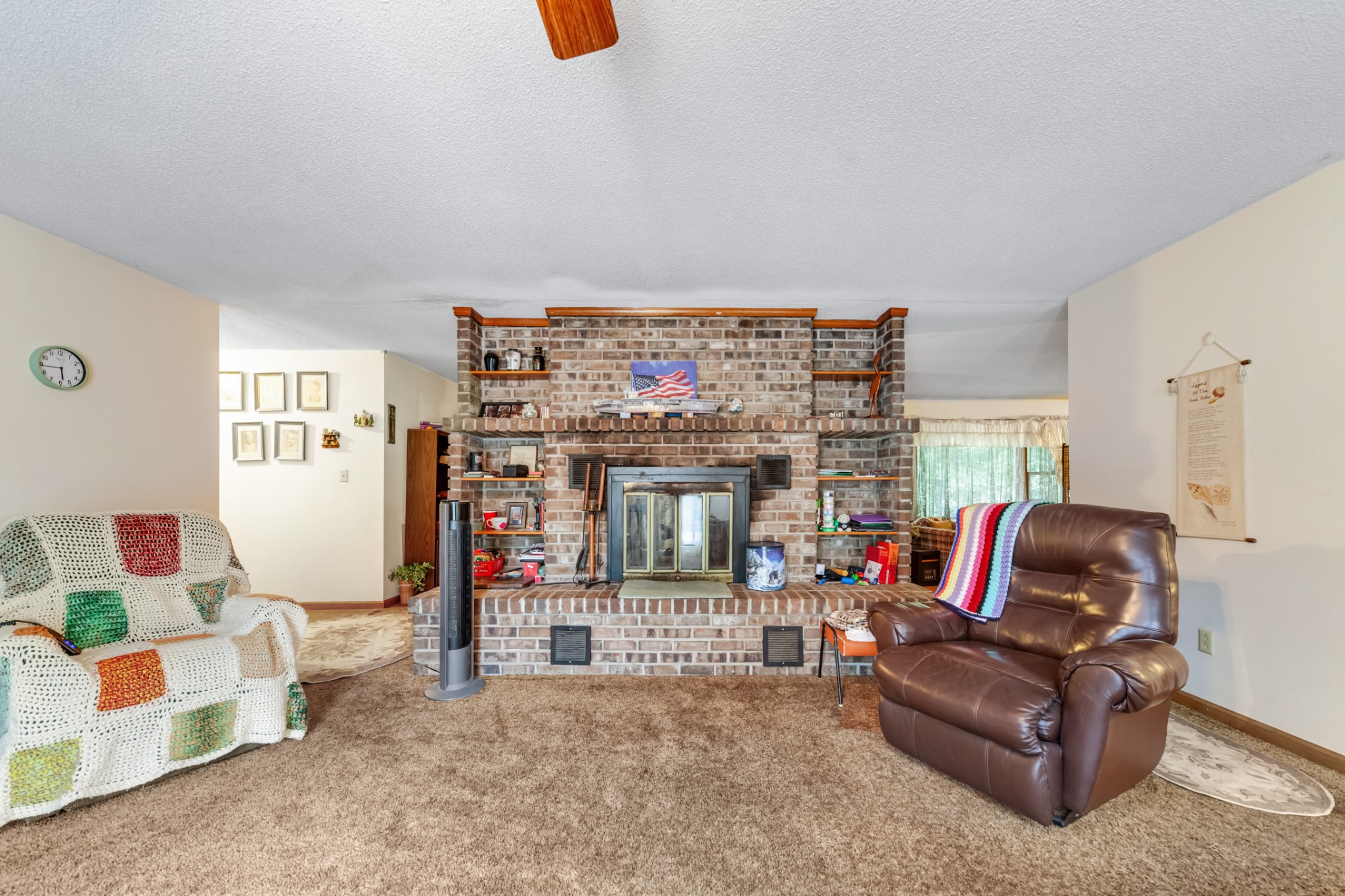 2756 Glasscock Road Lewisburg, TN 37091 - Photo 23 of 48 a living room with furniture and a fireplace