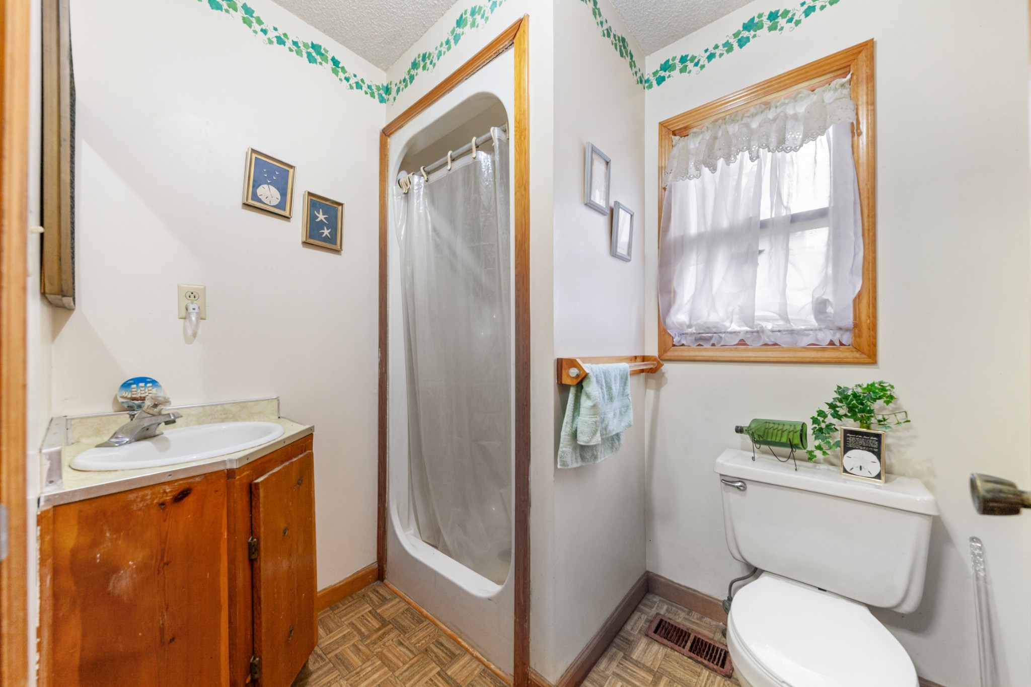 2756 Glasscock Road Lewisburg, TN 37091 - Photo 25 of 48 a bathroom with a granite countertop toilet sink and mirror