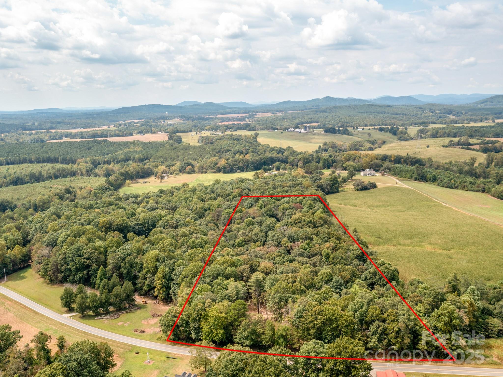 481 Eupeptic Springs Road, Unit LOT 5 Olin, NC 28660 - Photo 19 of 20 a view of an ocean and mountain