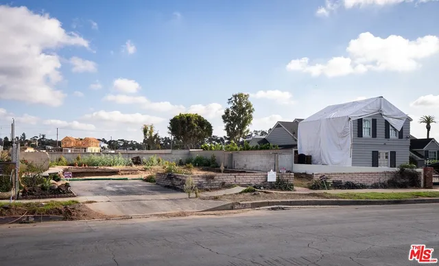 a view of a street with houses