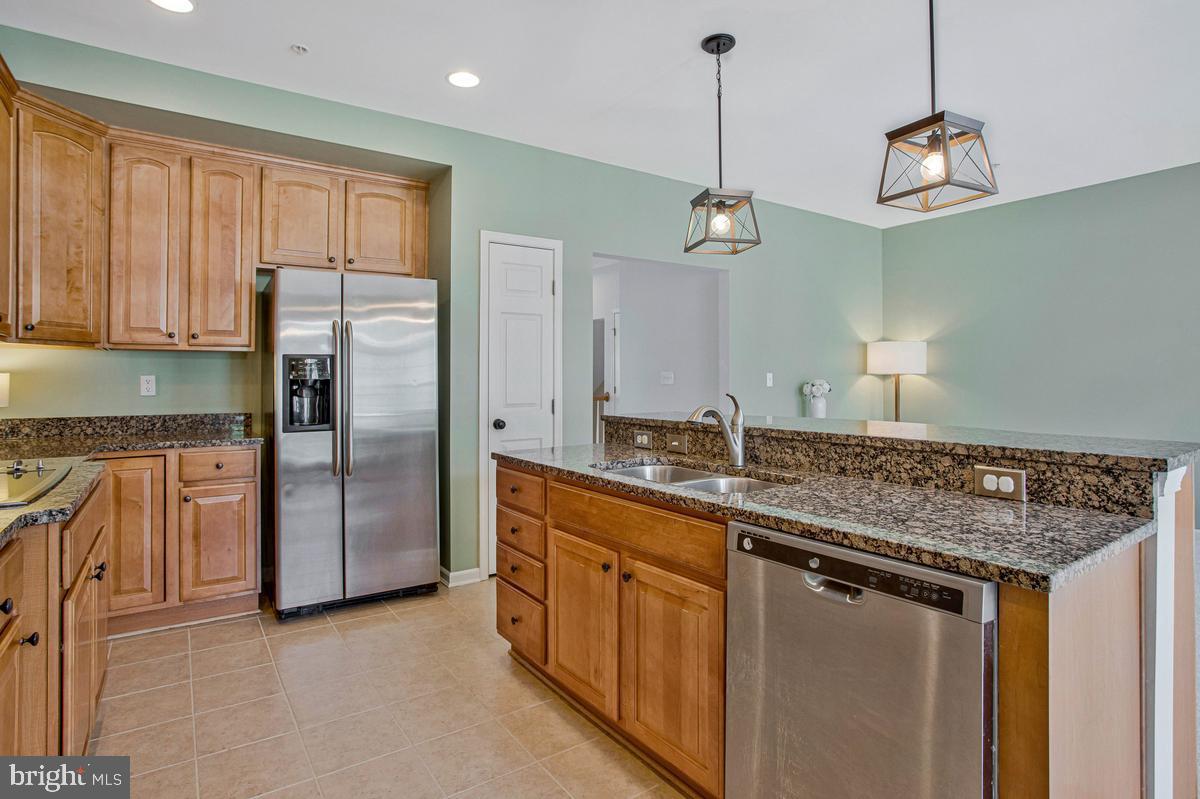 2310 Forest Ridge Terrace, Unit 6 Chesapeake Beach, MD 20732 - Photo 13 of 58 Island with sink and dishwasher