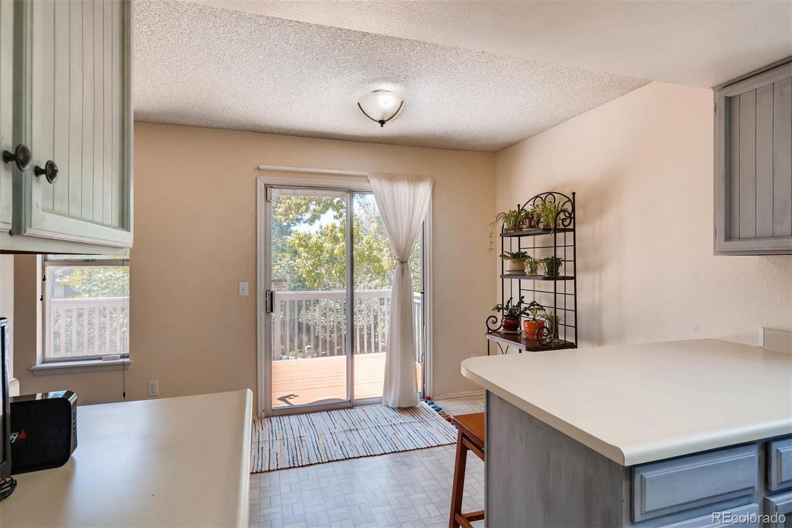 69 Prairie Ridge Road Highlands Ranch, CO 80126 - Photo 9 of 28 a very nice looking room with a large window and a bed
