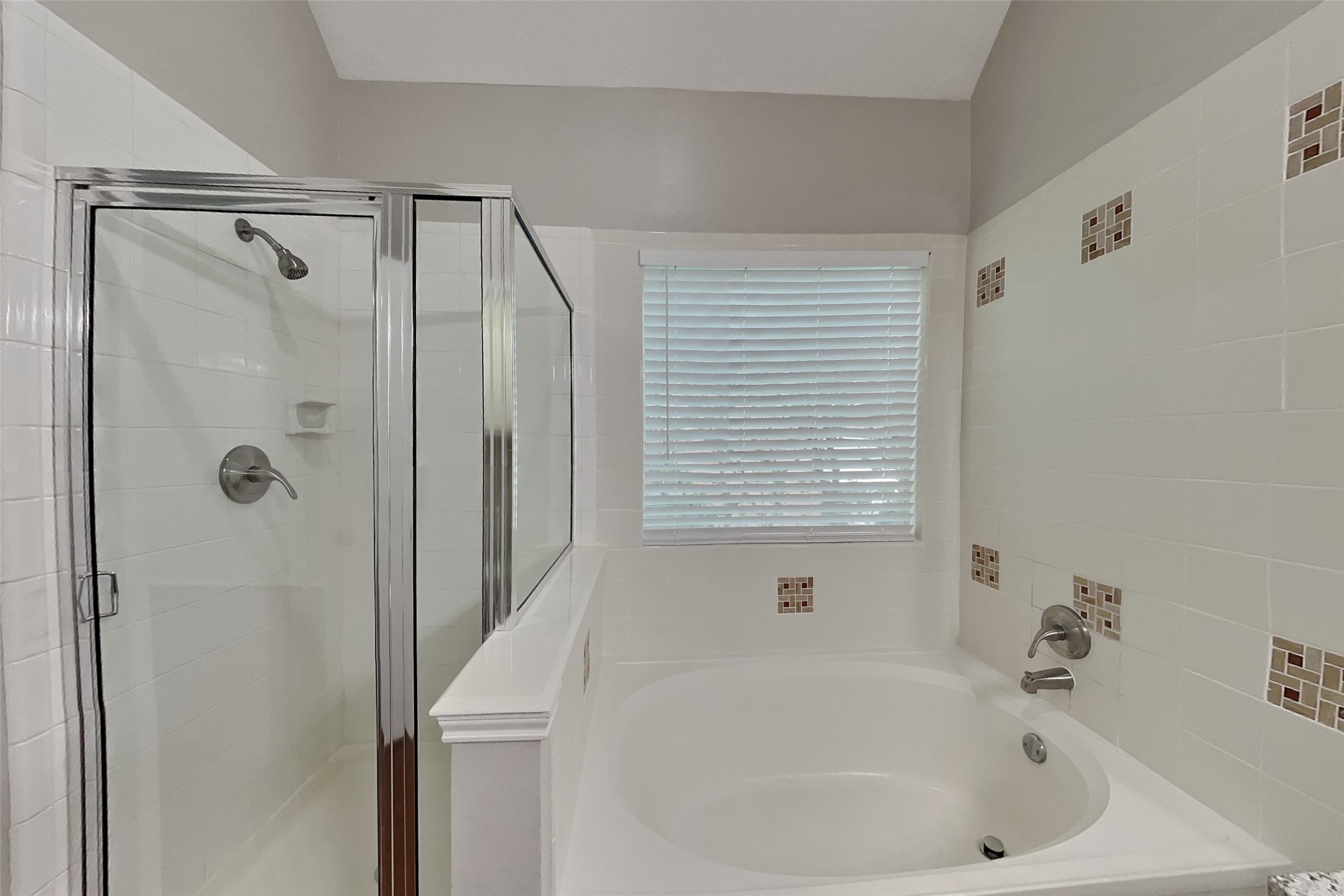 619 Bending Bough Drive Spring, TX 77388 - Photo 10 of 22 a white bath tub sitting next to a shower