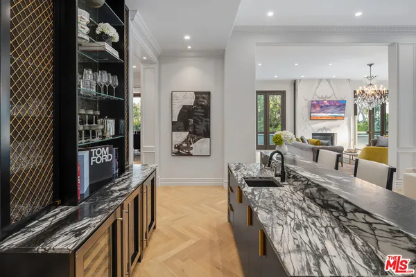 a kitchen with a table and chairs in it