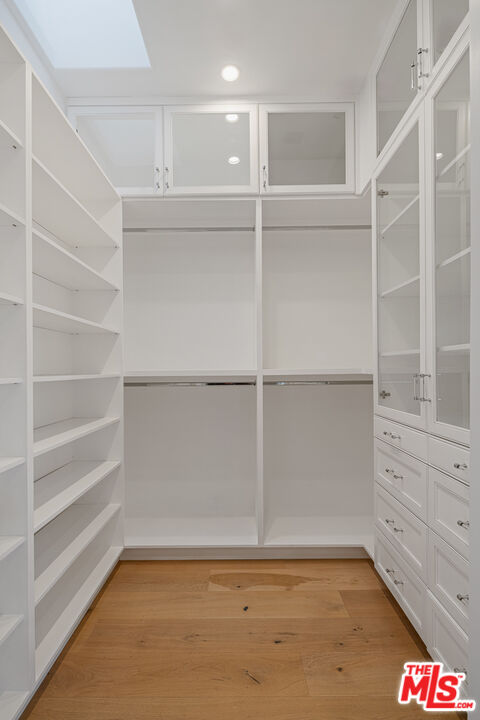 402 Doheny Road Beverly Hills, CA 90210 - Photo 44 of 55 a view of an empty walk in closet