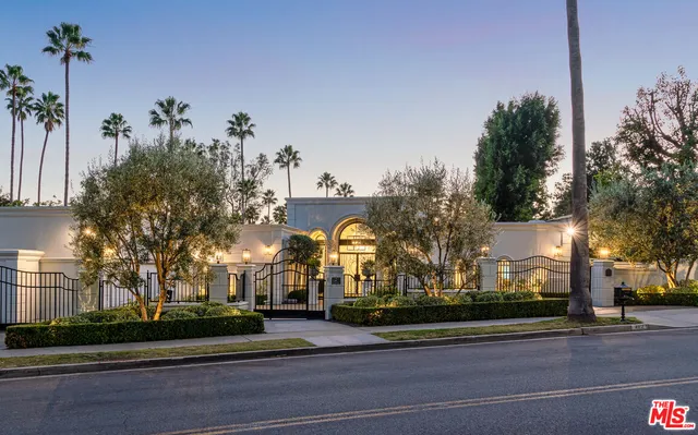 a view of a swimming pool with chairs