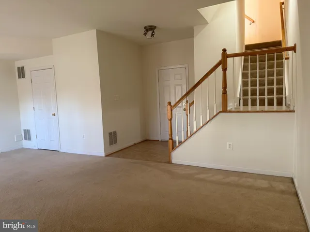 a view of an entryway with staircase