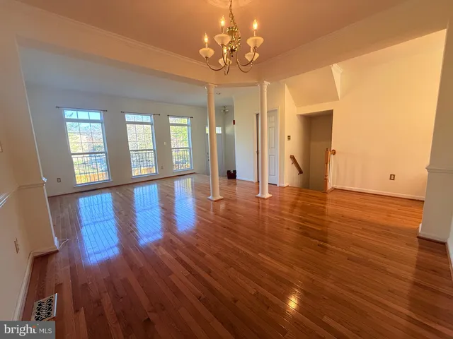 a view of a livingroom with wooden floor