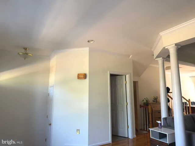 a bathroom with a shower and a glass door