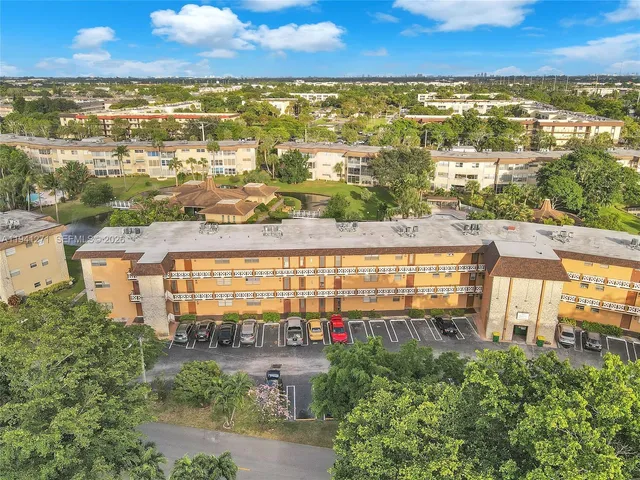 a view of city with ocean