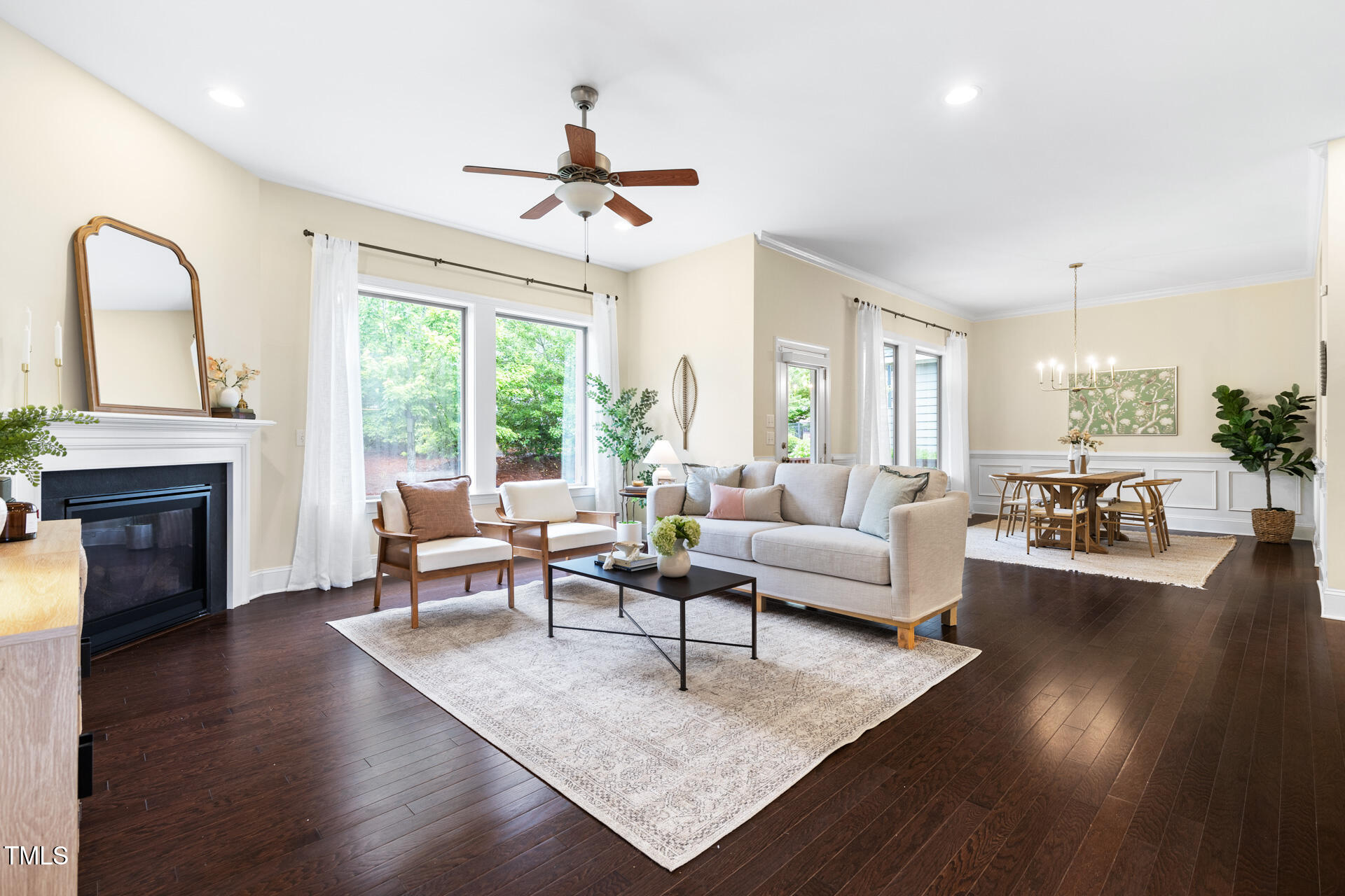 204 Mill Chapel Road Chapel Hill, NC 27517 - Photo 11 of 38 a living room with furniture a fireplace and a large window