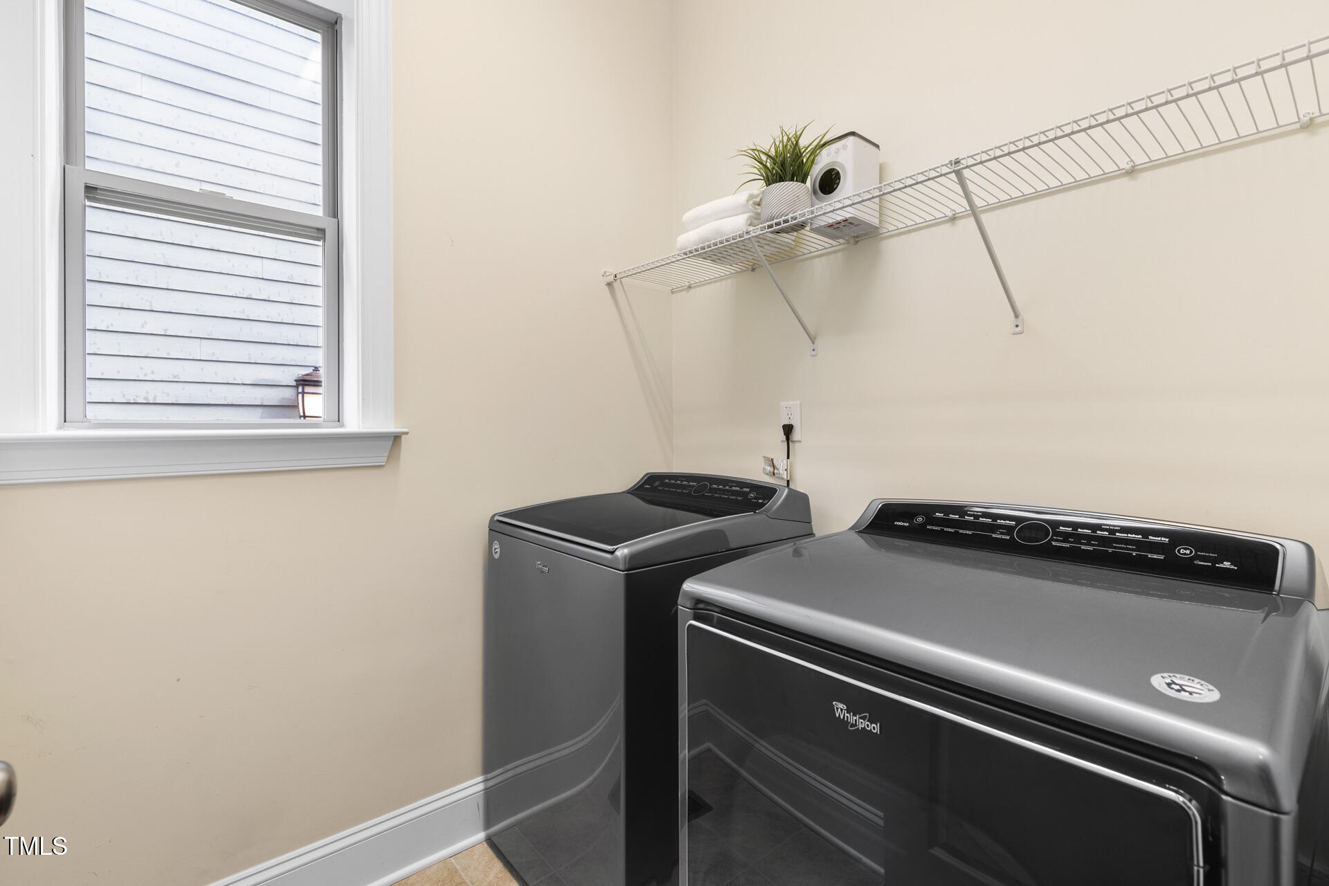 204 Mill Chapel Road Chapel Hill, NC 27517 - Photo 20 of 38 a close view of utility room with washer and dryer