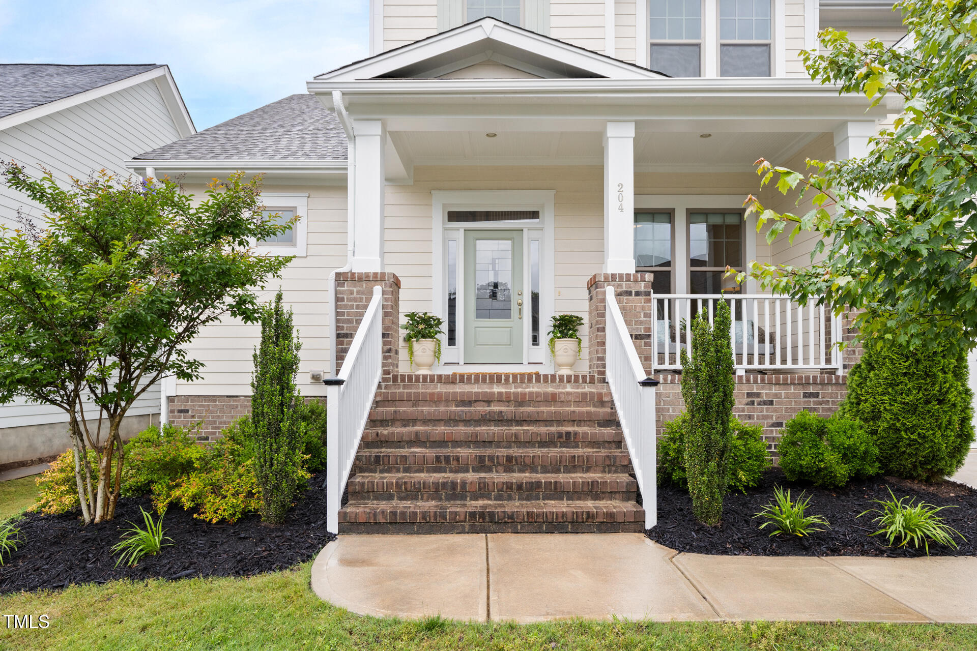 204 Mill Chapel Road Chapel Hill, NC 27517 - Photo 2 of 38 a front view of a house with a yard