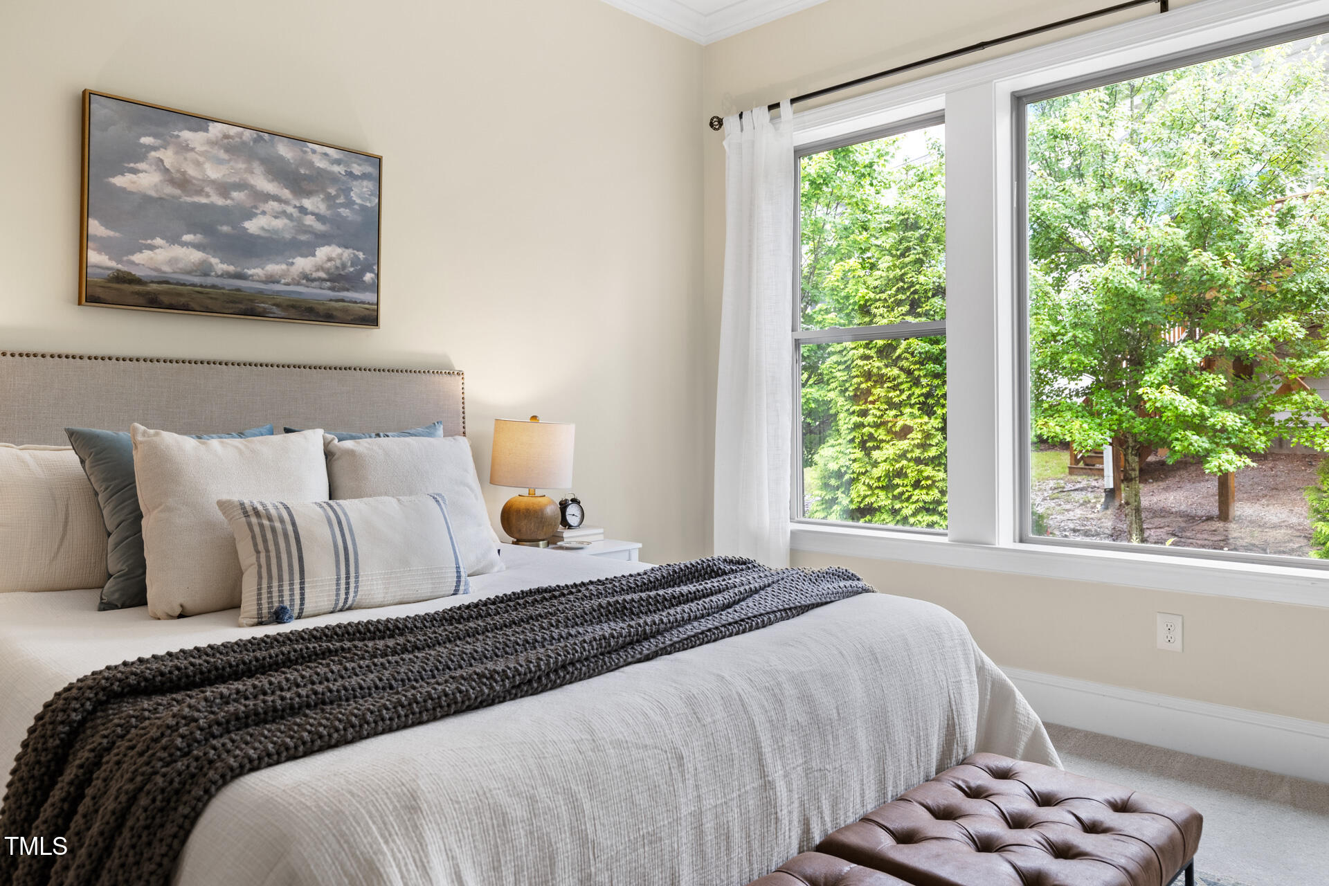204 Mill Chapel Road Chapel Hill, NC 27517 - Photo 23 of 38 a bedroom with a bed and a large window