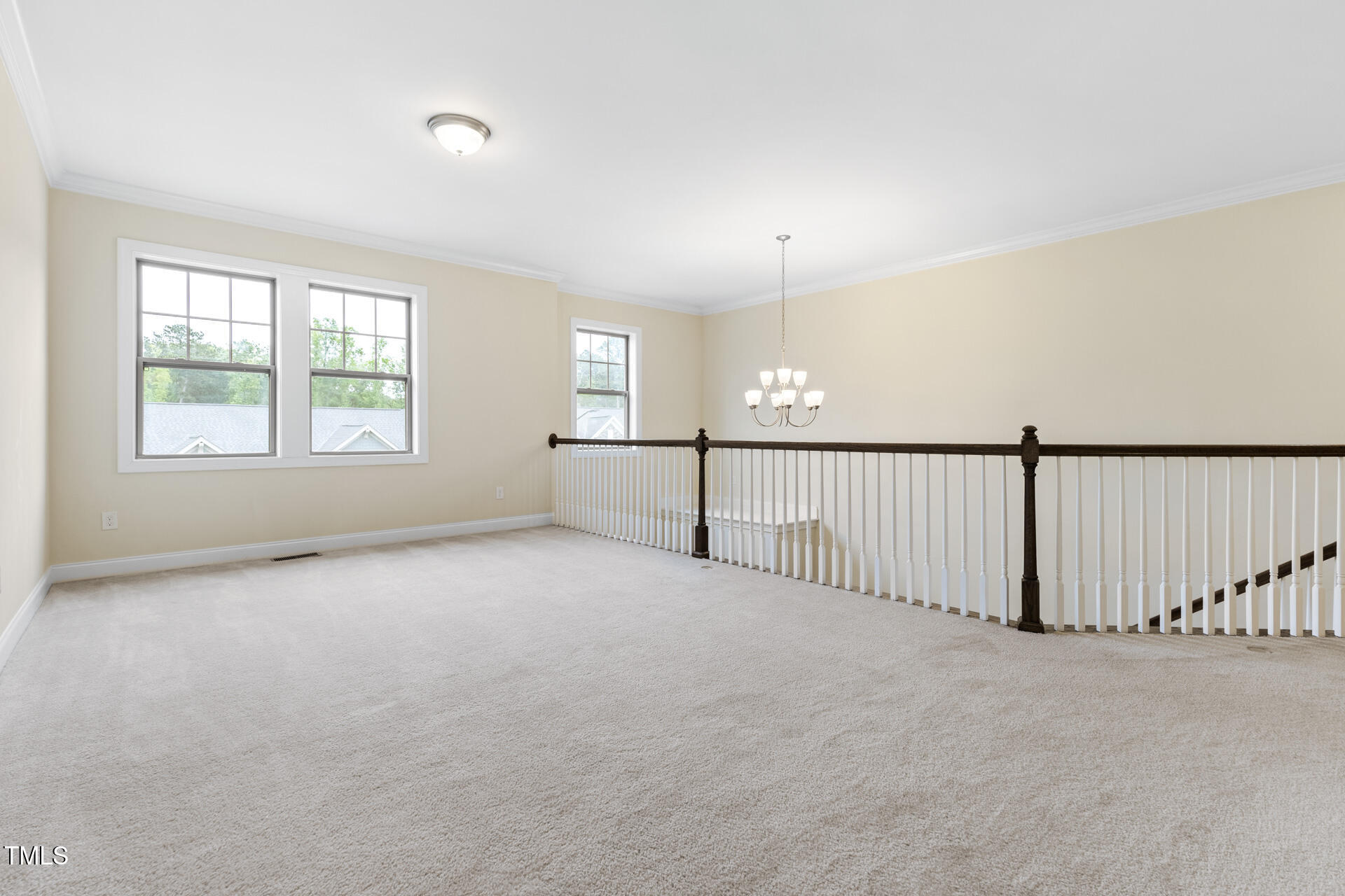 204 Mill Chapel Road Chapel Hill, NC 27517 - Photo 29 of 38 an empty room with floor to ceiling windows and windows