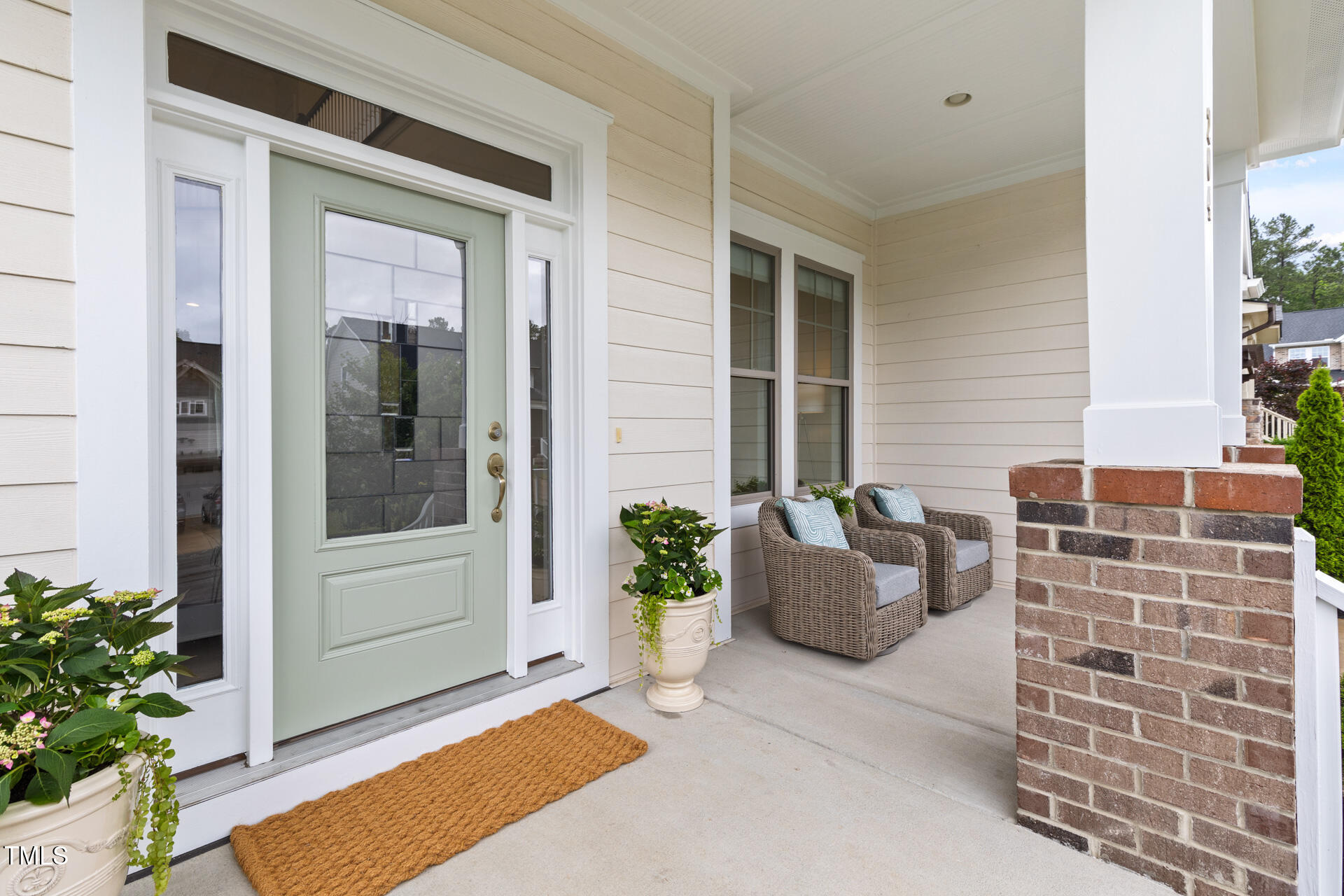 204 Mill Chapel Road Chapel Hill, NC 27517 - Photo 3 of 38 a view of a patio with couches and potted plants