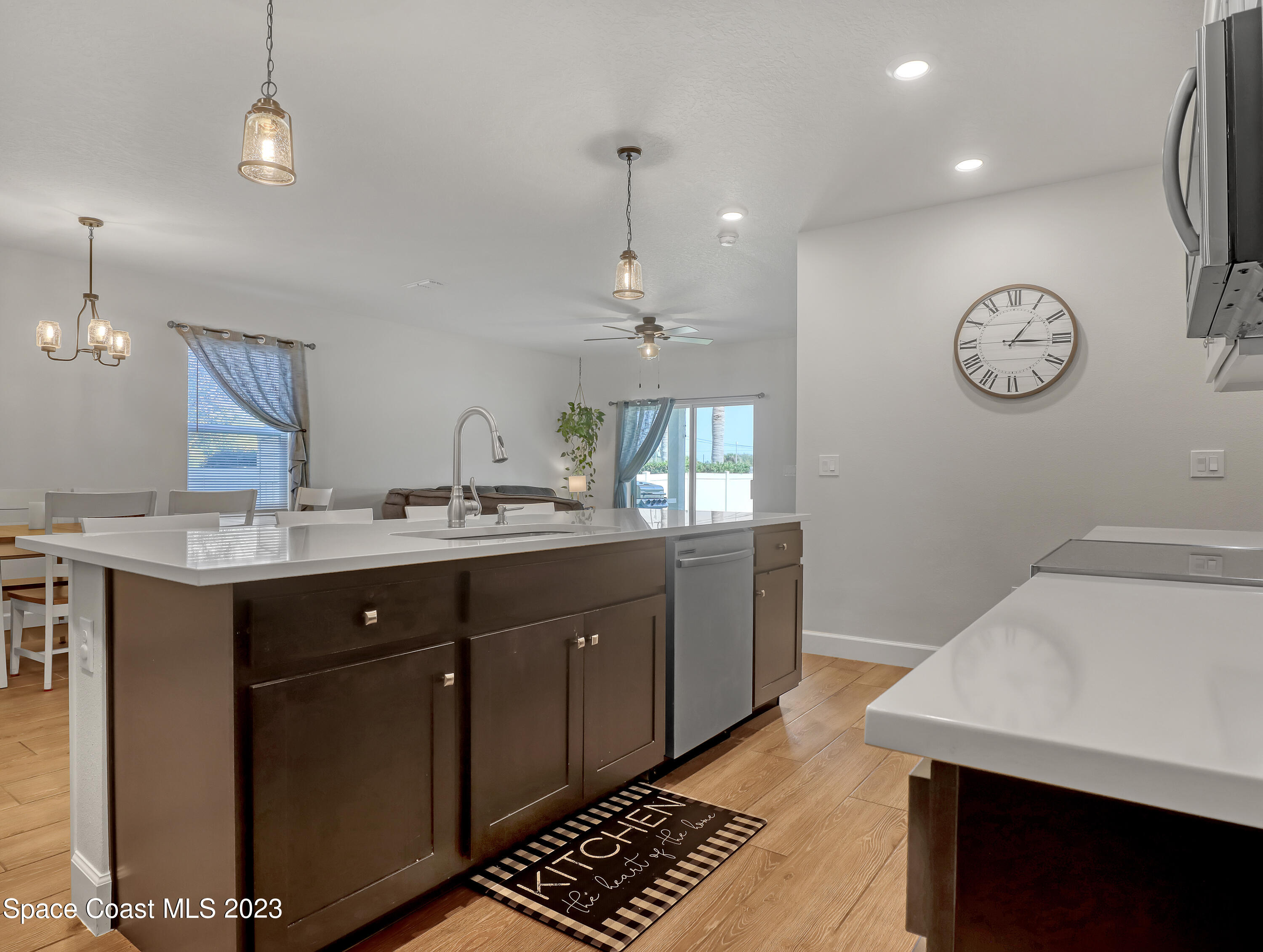 1807 Elkins Point Melbourne, FL 32935 - Photo 12 of 52 a bathroom with a sink a vanity and a large mirror