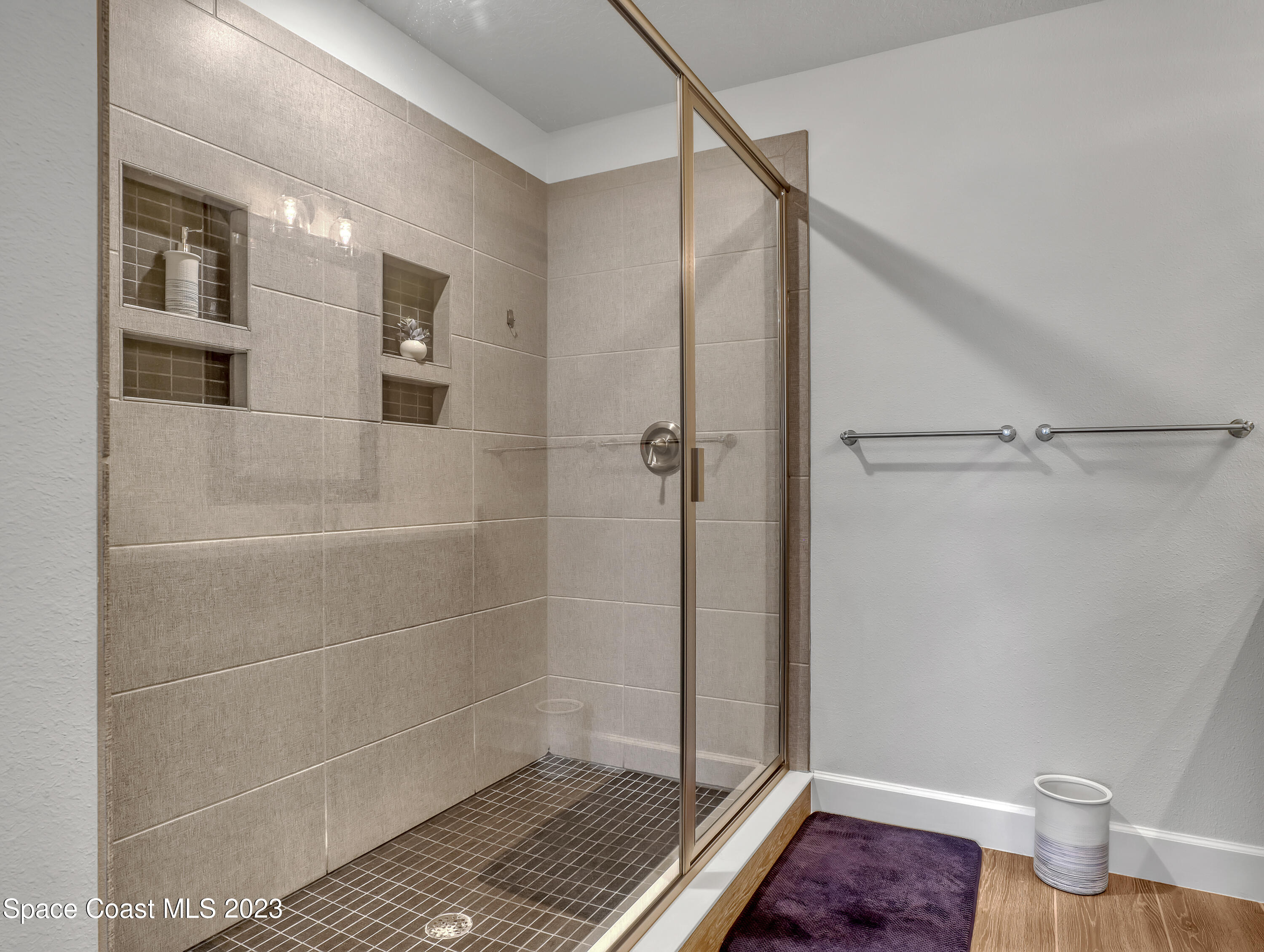 1807 Elkins Point Melbourne, FL 32935 - Photo 27 of 52 a bathroom with a shower