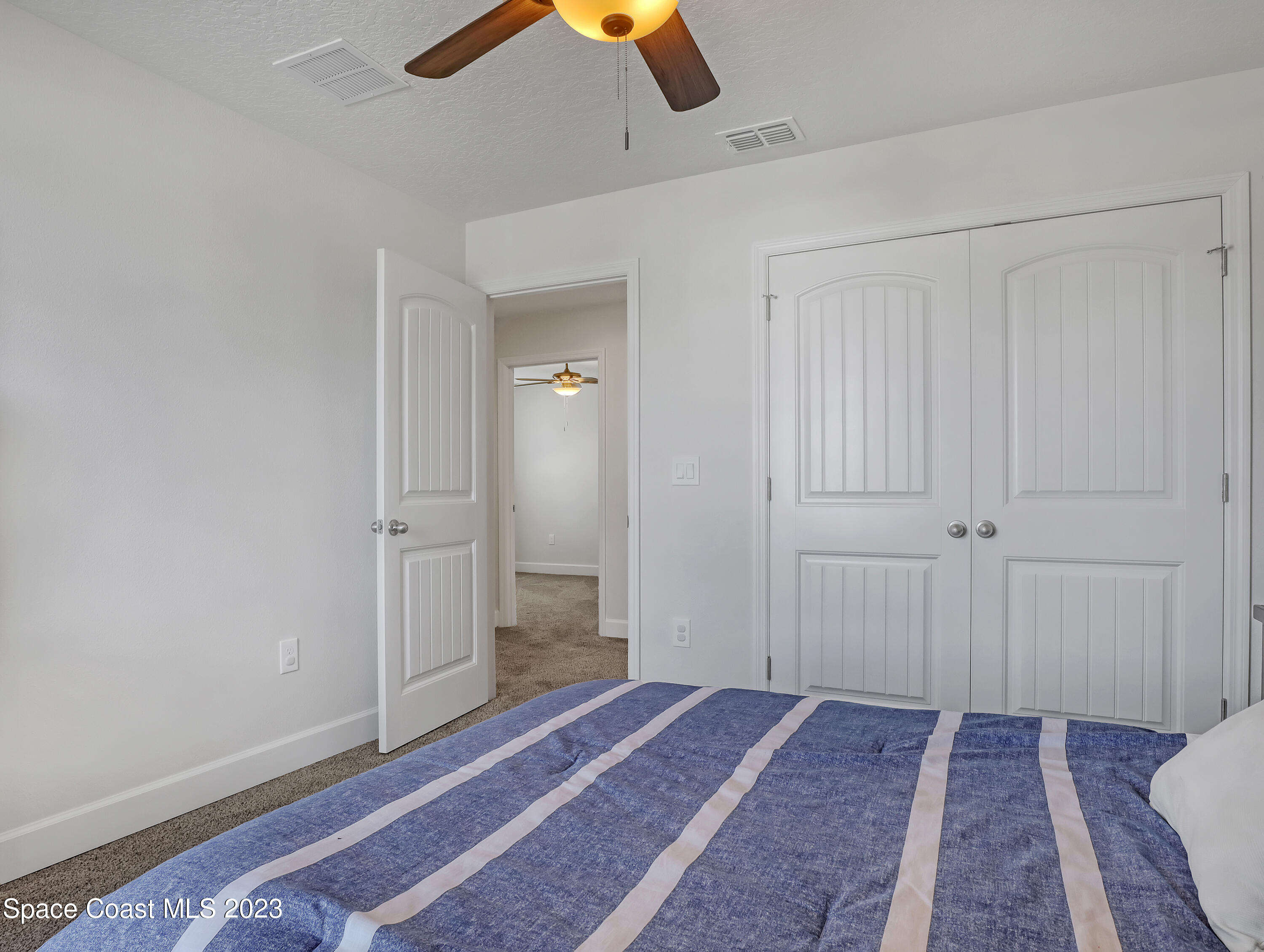 1807 Elkins Point Melbourne, FL 32935 - Photo 37 of 52 wooden floor and closet in a room