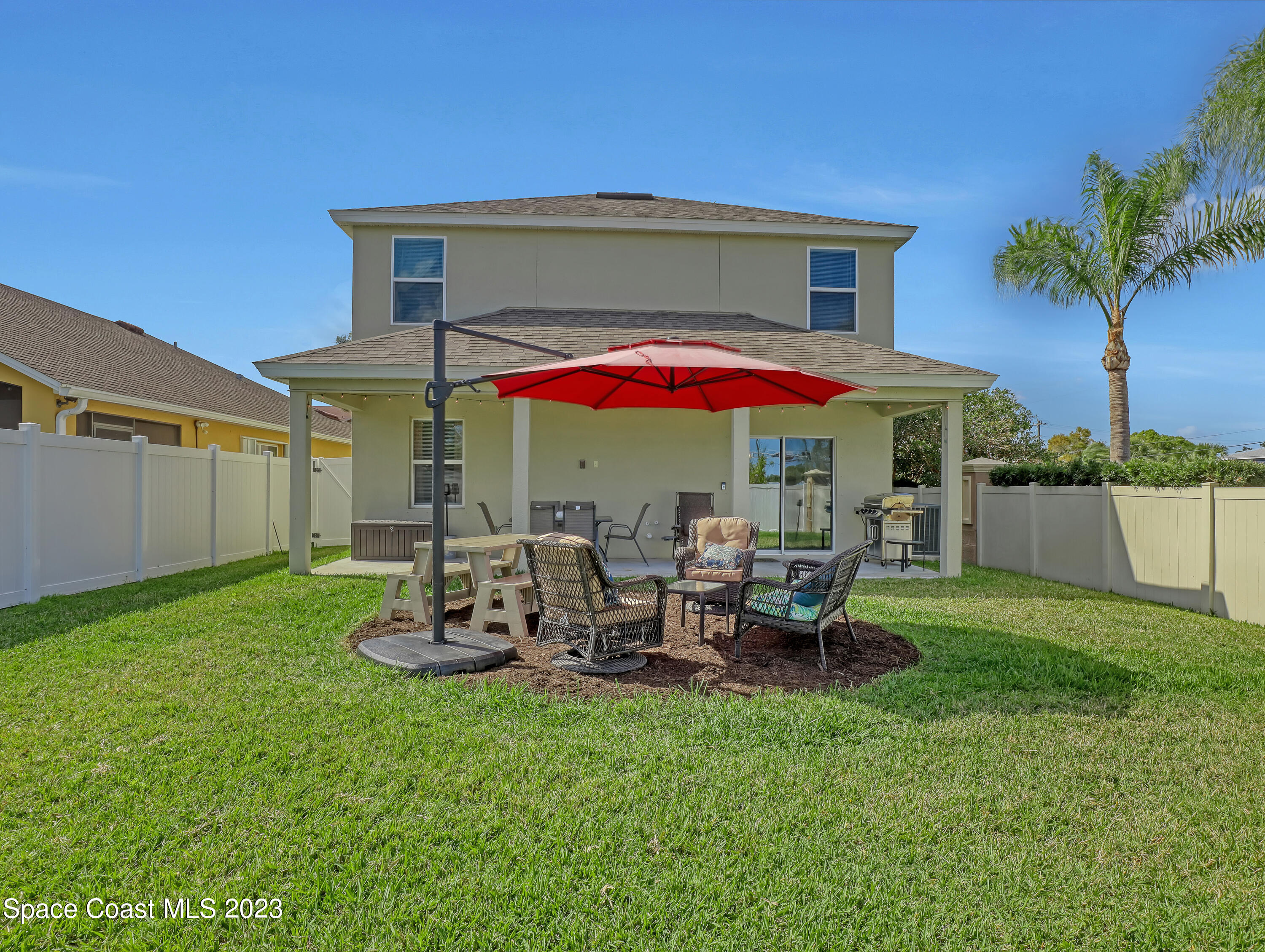 1807 Elkins Point Melbourne, FL 32935 - Photo 45 of 52 a view of outdoor space yard and patio