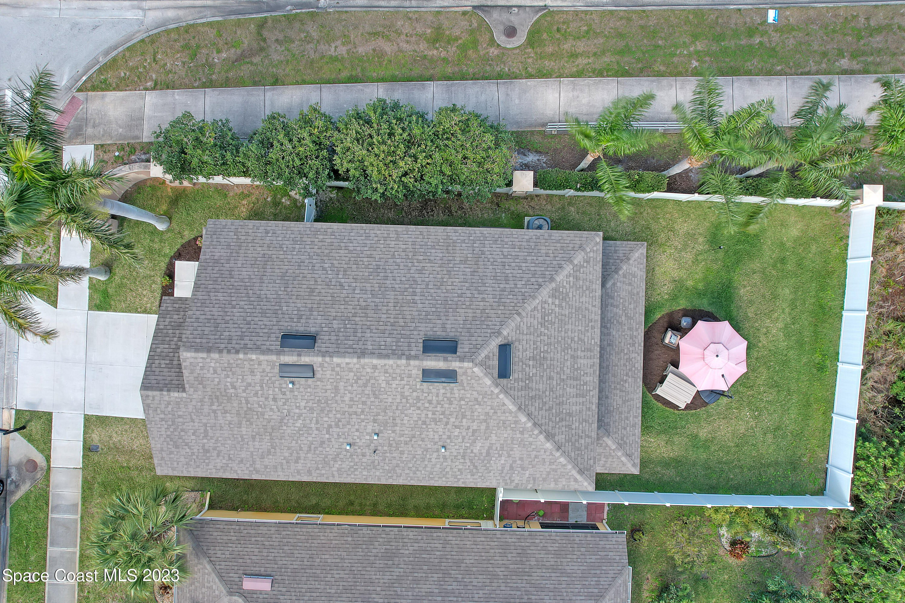 1807 Elkins Point Melbourne, FL 32935 - Photo 47 of 52 an aerial view of a house with a yard