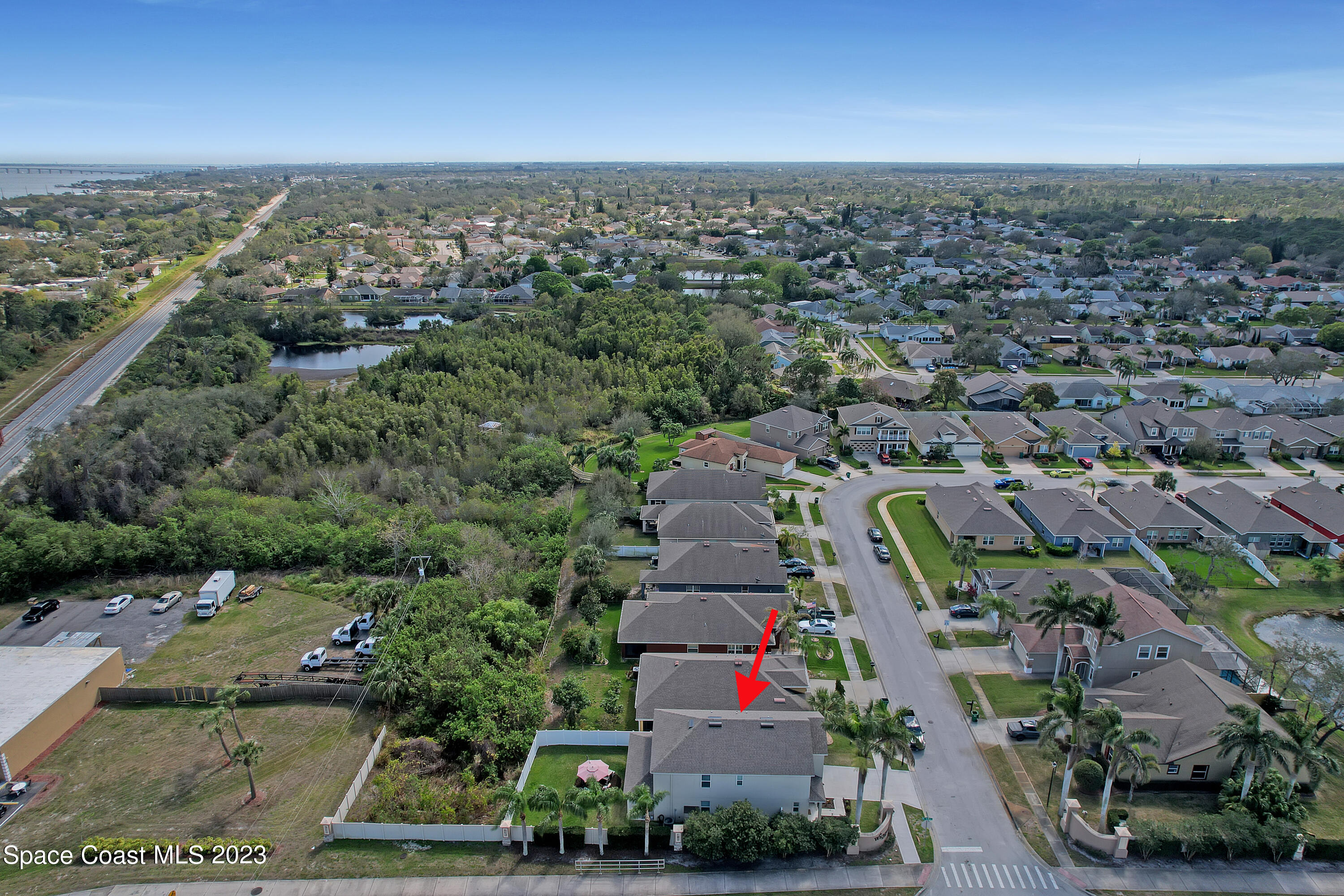 1807 Elkins Point Melbourne, FL 32935 - Photo 51 of 52 an aerial view of a city with lots of residential buildings