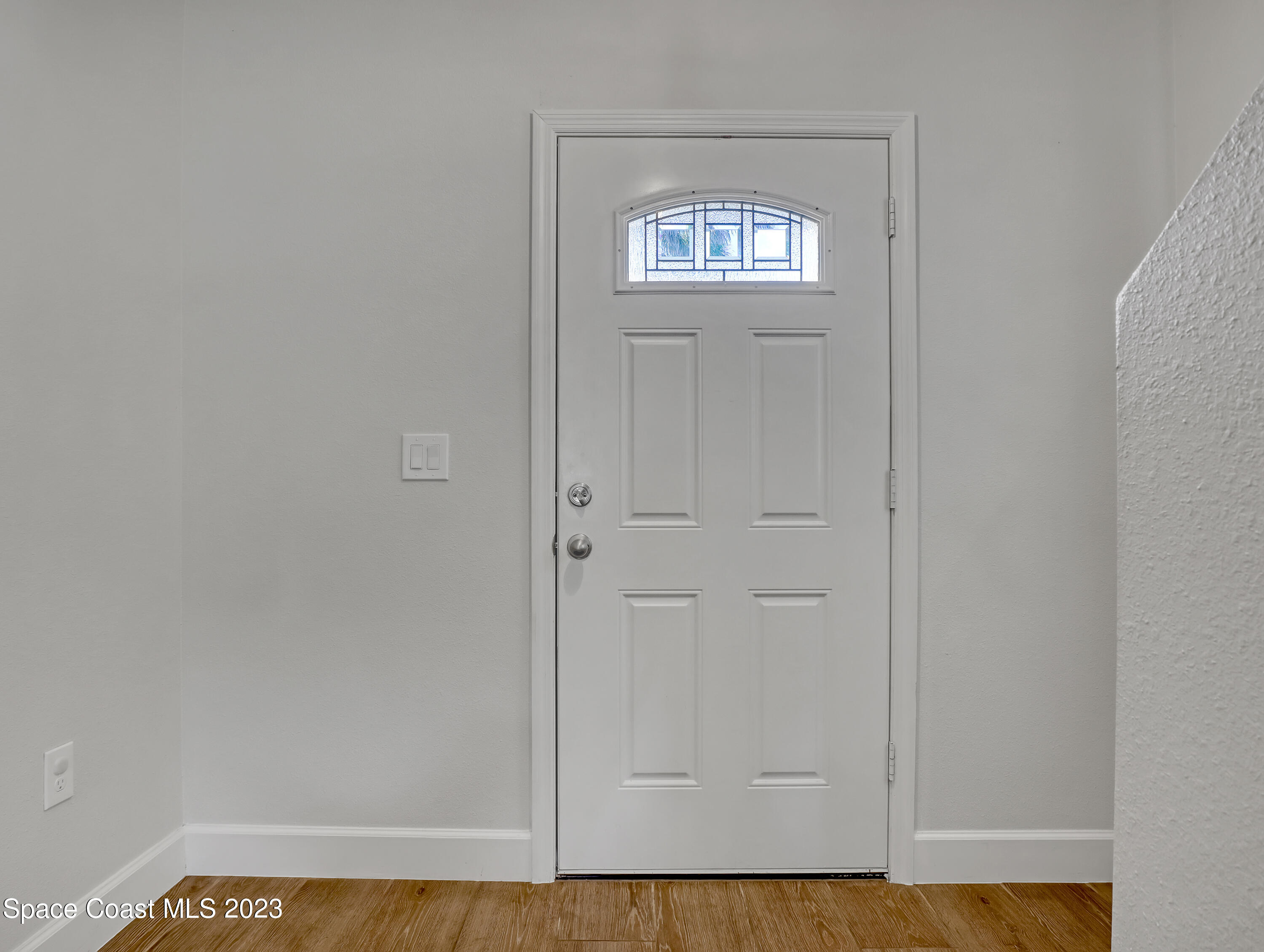 1807 Elkins Point Melbourne, FL 32935 - Photo 6 of 52 a view of an entryway door
