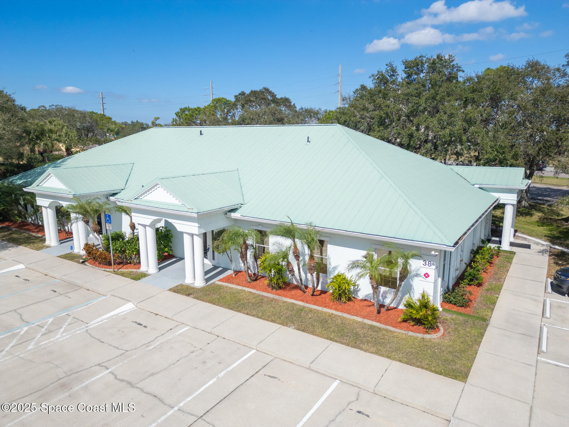 38 Suntree Place, Unit 2 Melbourne, FL 32940 - Photo 1 of 52 a view of a street with sitting area