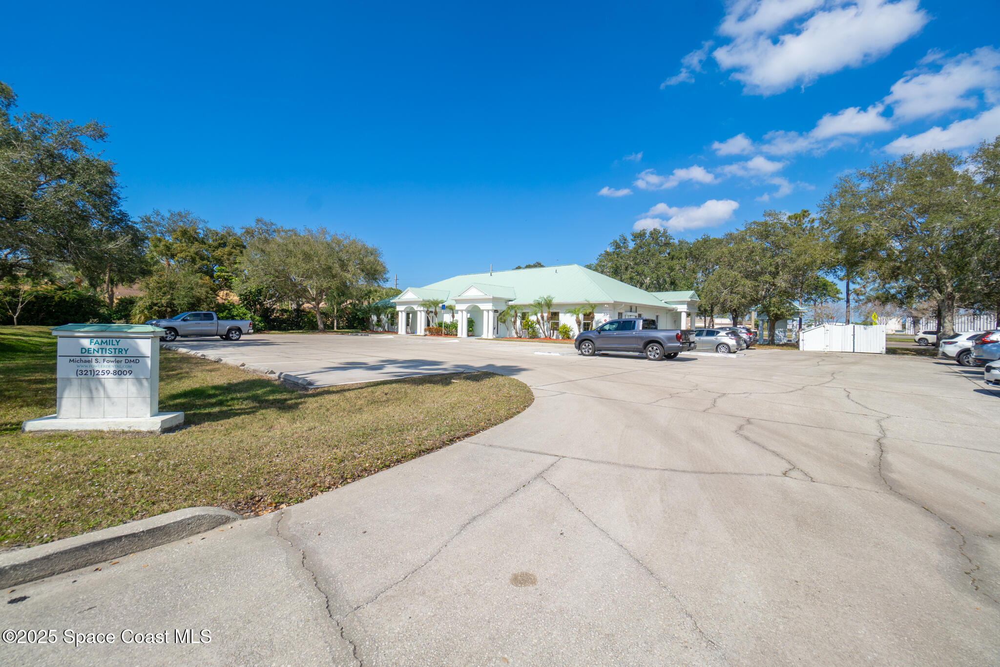 38 Suntree Place, Unit 2 Melbourne, FL 32940 - Photo 12 of 52 a view of swimming pool with outdoor seating and plants