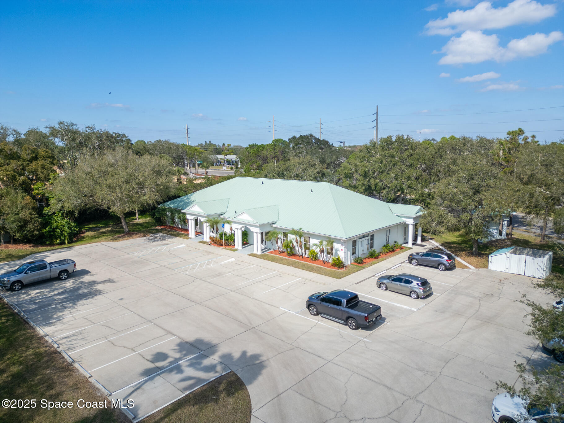 38 Suntree Place, Unit 2 Melbourne, FL 32940 - Photo 13 of 52 a view of a terrace with sitting area