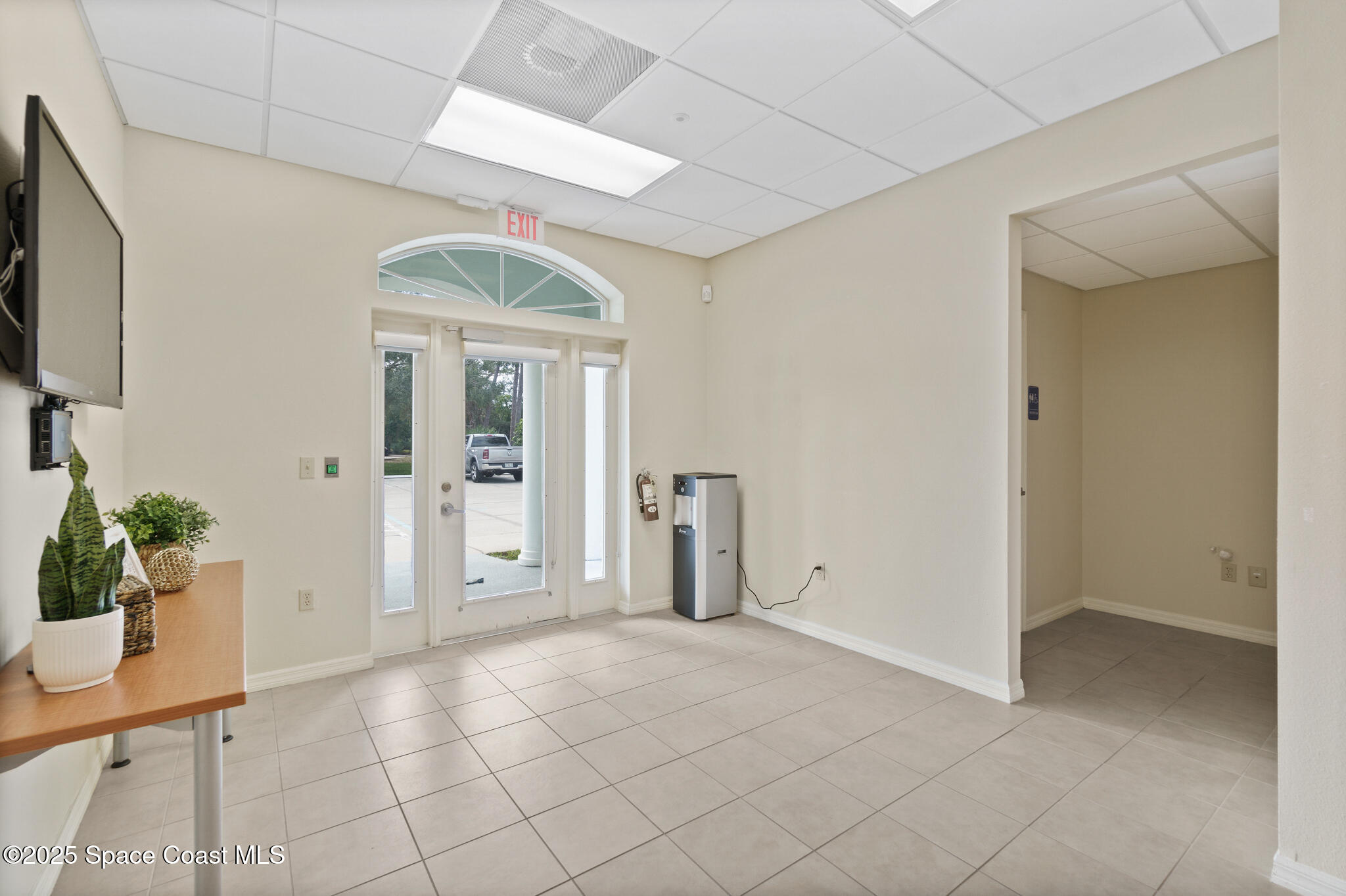 38 Suntree Place, Unit 2 Melbourne, FL 32940 - Photo 23 of 52 a view of an entryway with wooden floor