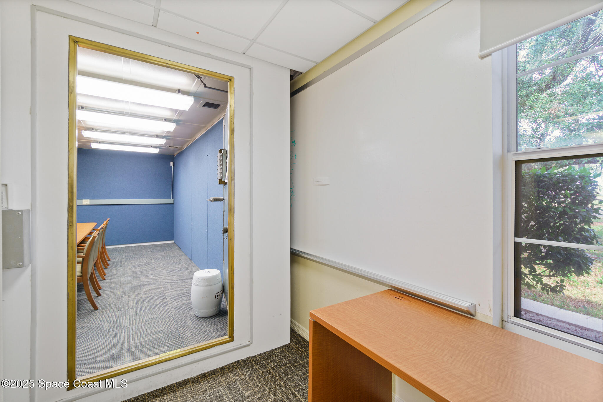 38 Suntree Place, Unit 2 Melbourne, FL 32940 - Photo 33 of 52 a view of walk in closet with window