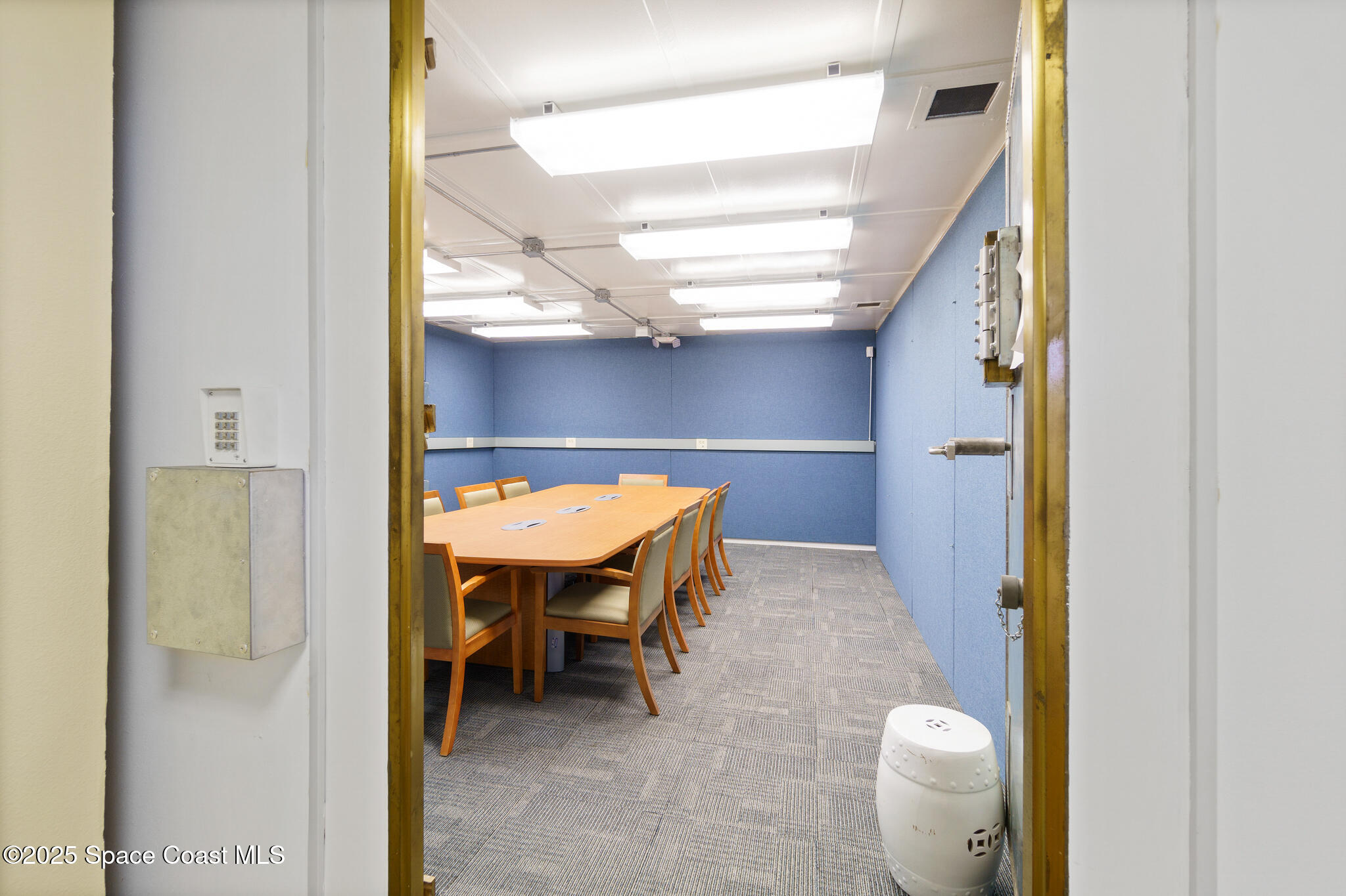 38 Suntree Place, Unit 2 Melbourne, FL 32940 - Photo 34 of 52 a bathroom with a sink and a mirror