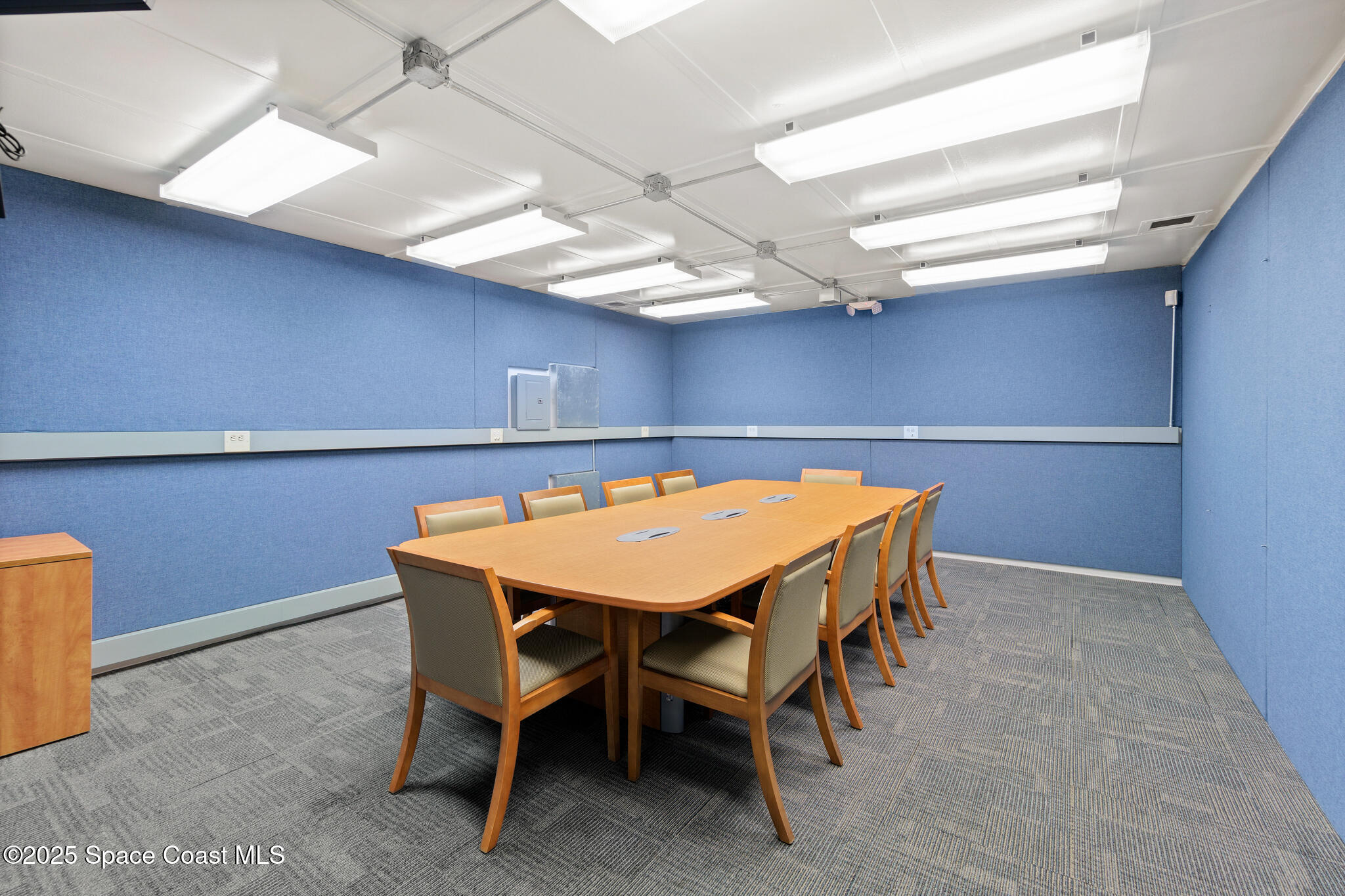 38 Suntree Place, Unit 2 Melbourne, FL 32940 - Photo 35 of 52 a view of a room with furniture and chandelier