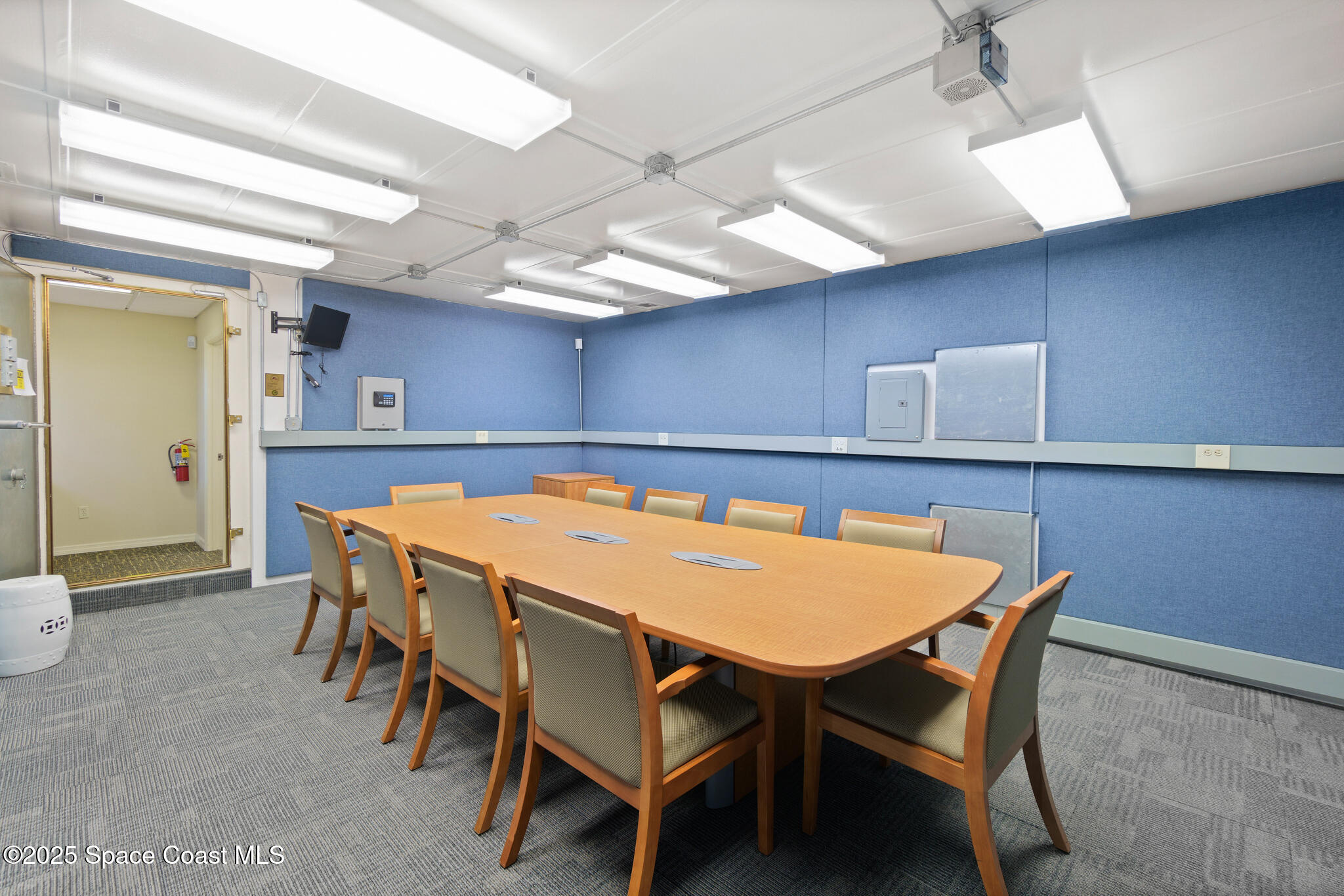 38 Suntree Place, Unit 2 Melbourne, FL 32940 - Photo 36 of 52 a view of a dining room with furniture