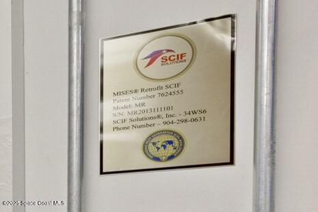 38 Suntree Place, Unit 2 Melbourne, FL 32940 - Photo 39 of 52 a wooden door with a sign on it